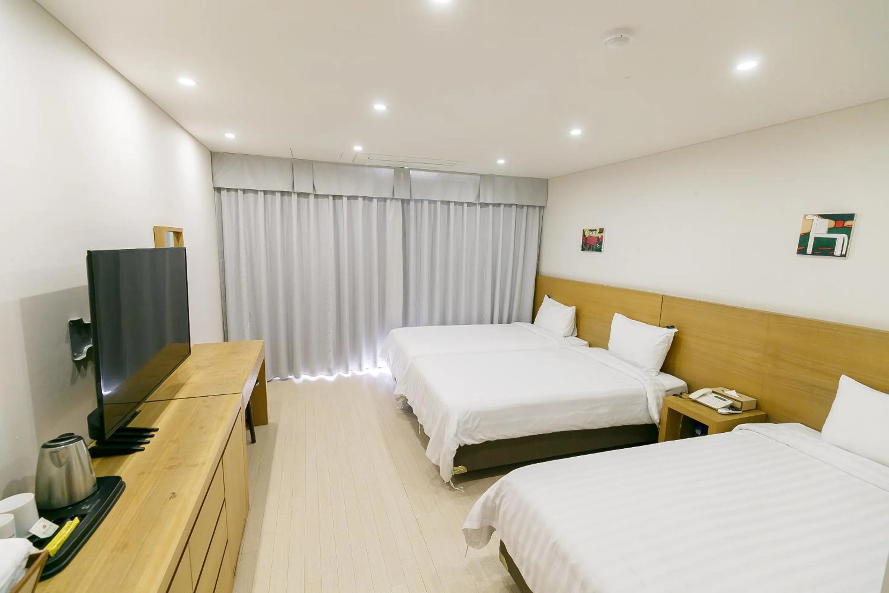 Photo of the whole room, Bed in BK Hotel Jeju