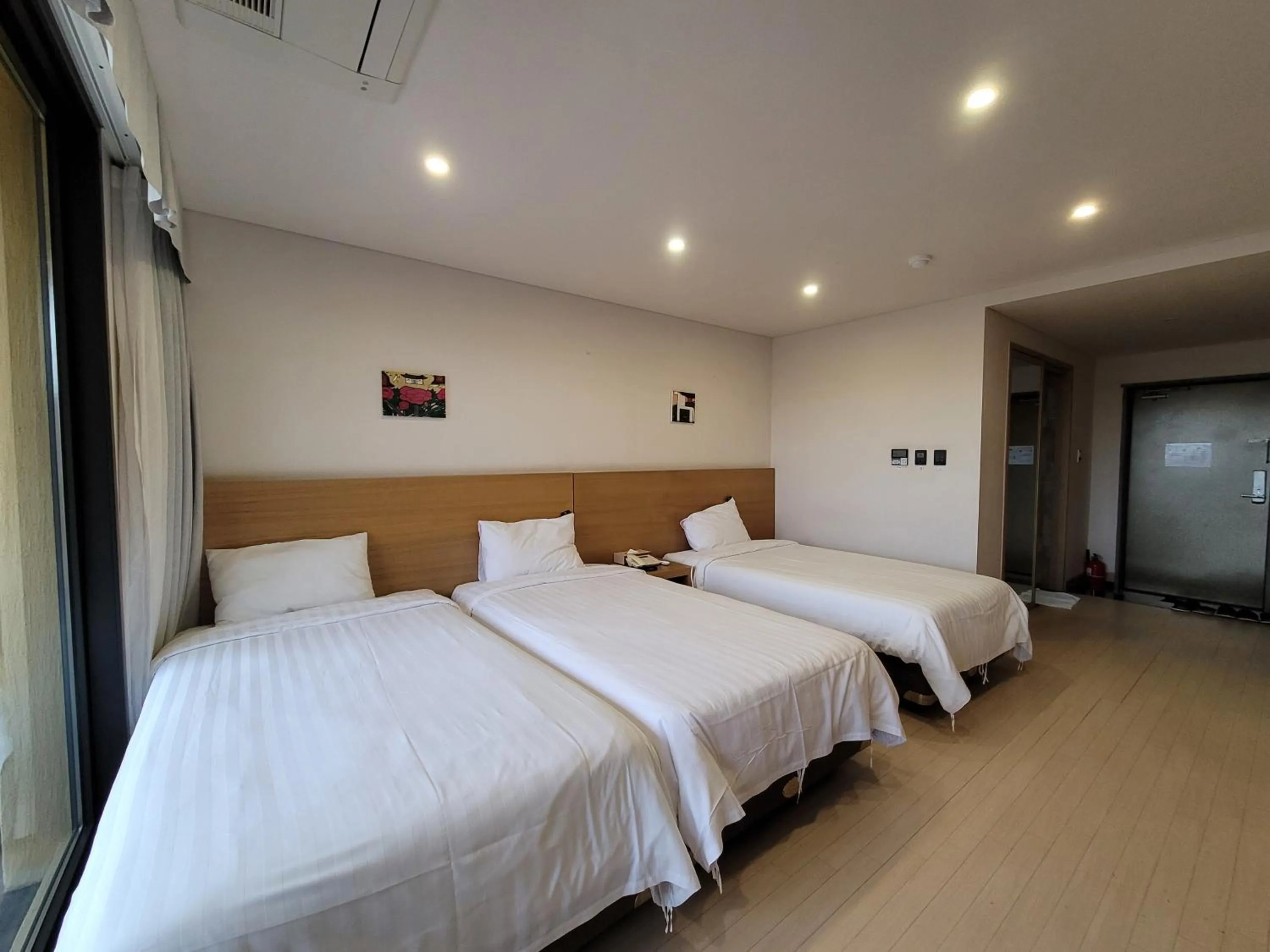 Bed in BK Hotel Jeju