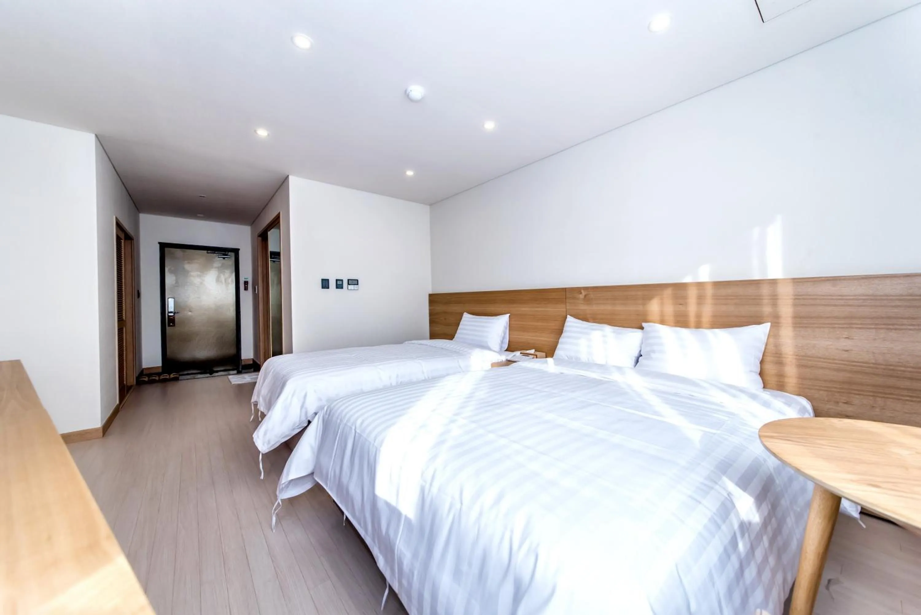 Bed in BK Hotel Jeju