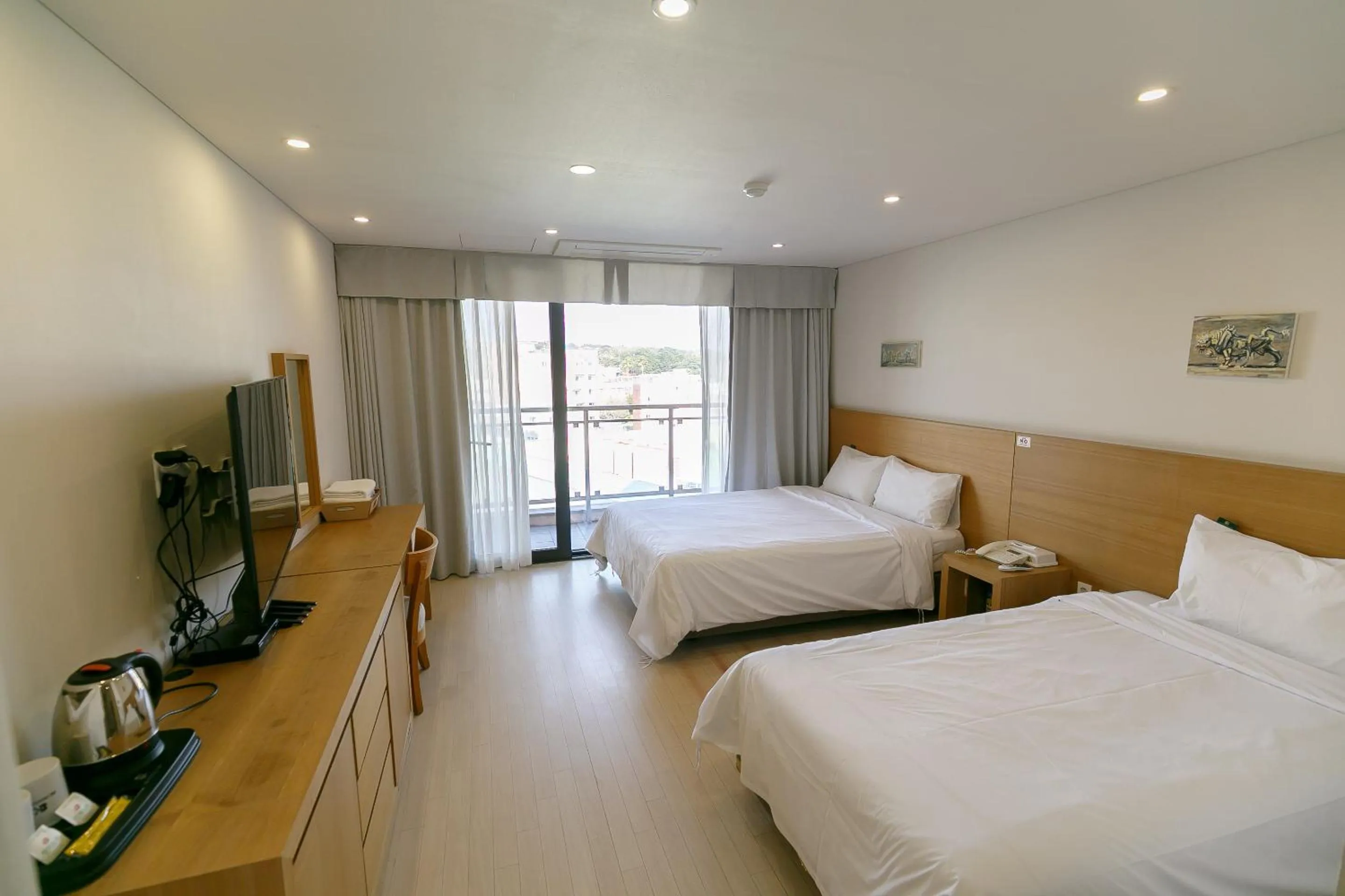 Photo of the whole room, Bed in BK Hotel Jeju