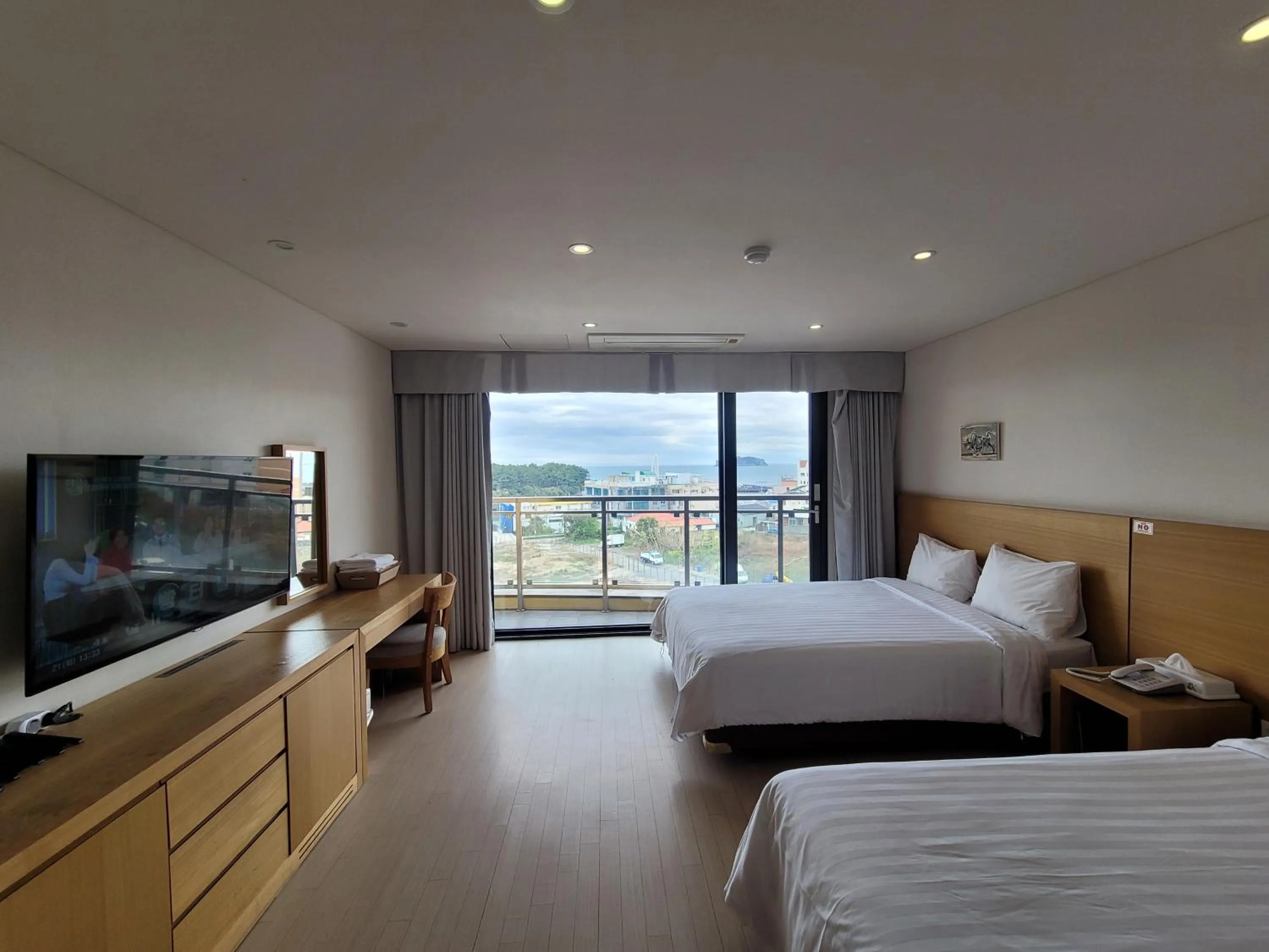 Photo of the whole room, Bed in BK Hotel Jeju