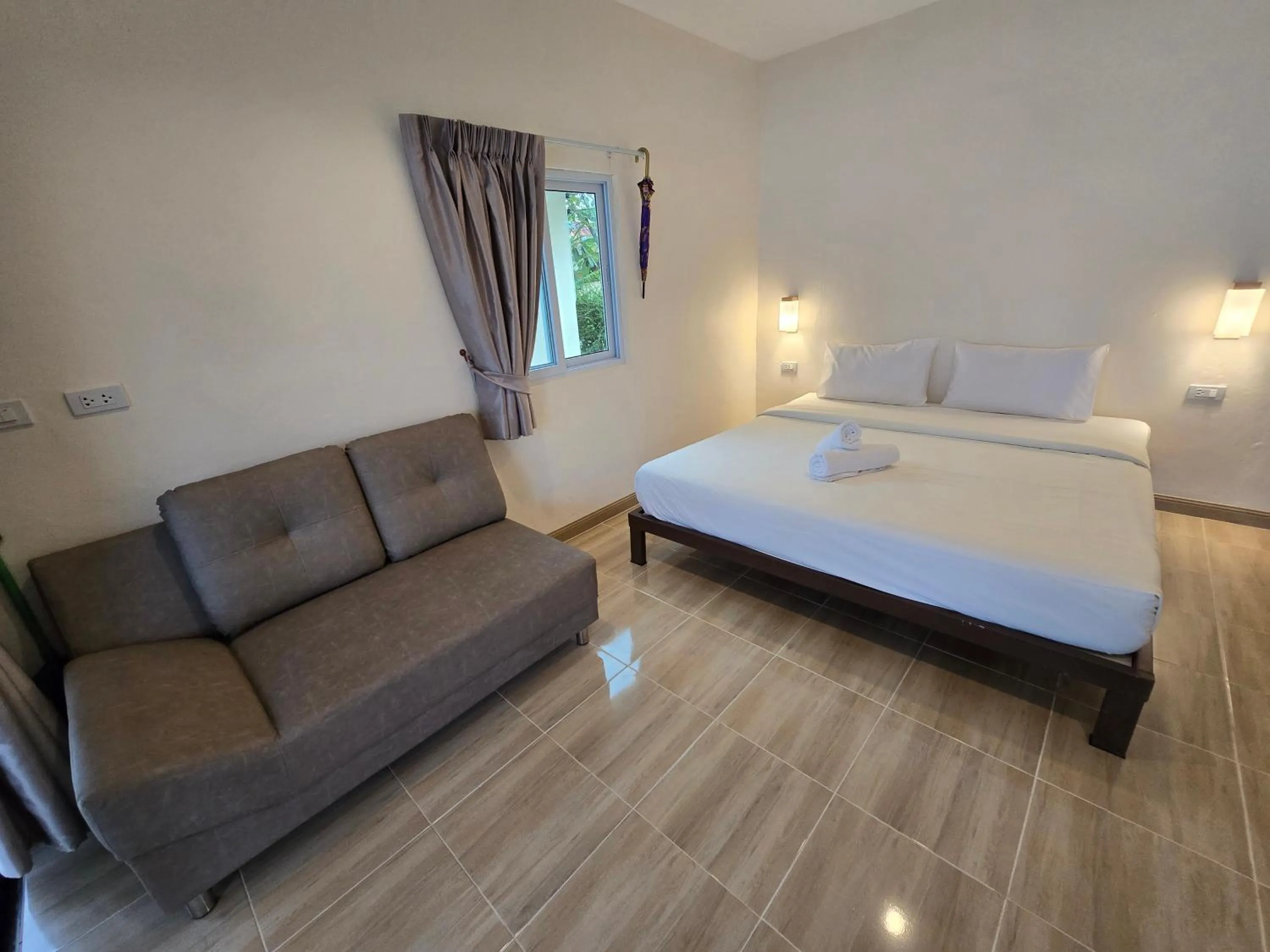 Bed in Kradan Beach Resort