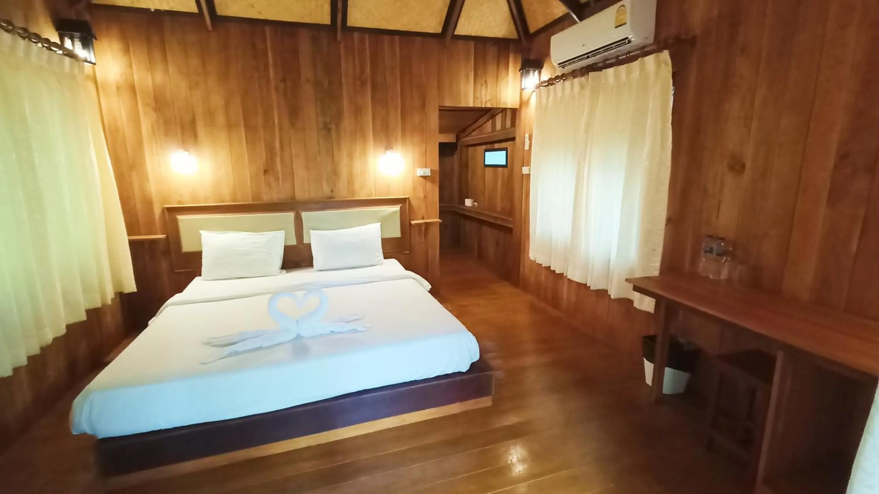 Bed in Kradan Beach Resort