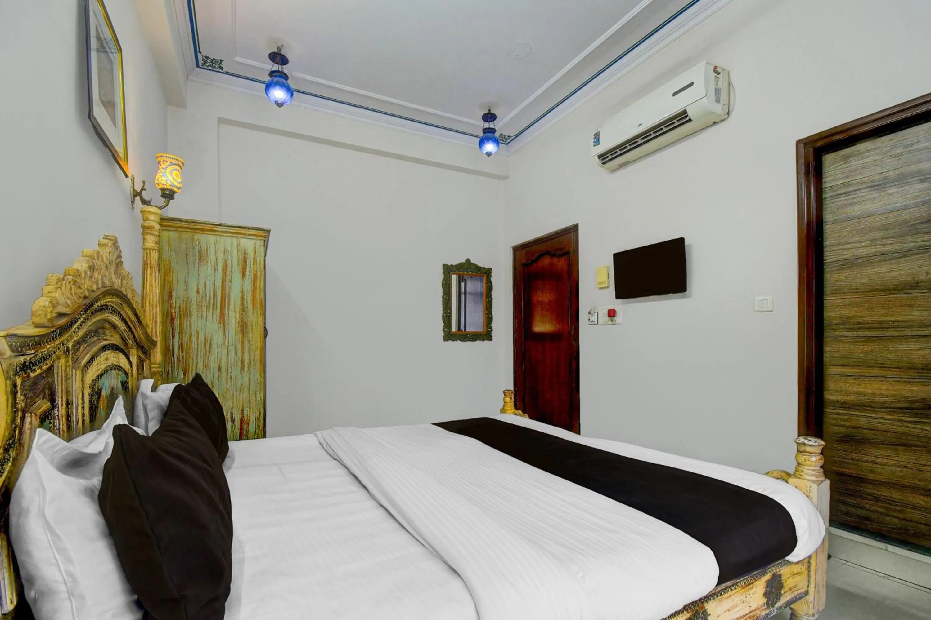 Bedroom, Bed in Collection O Jal Mahal Jaipur Formerly Little Ganesha Inn