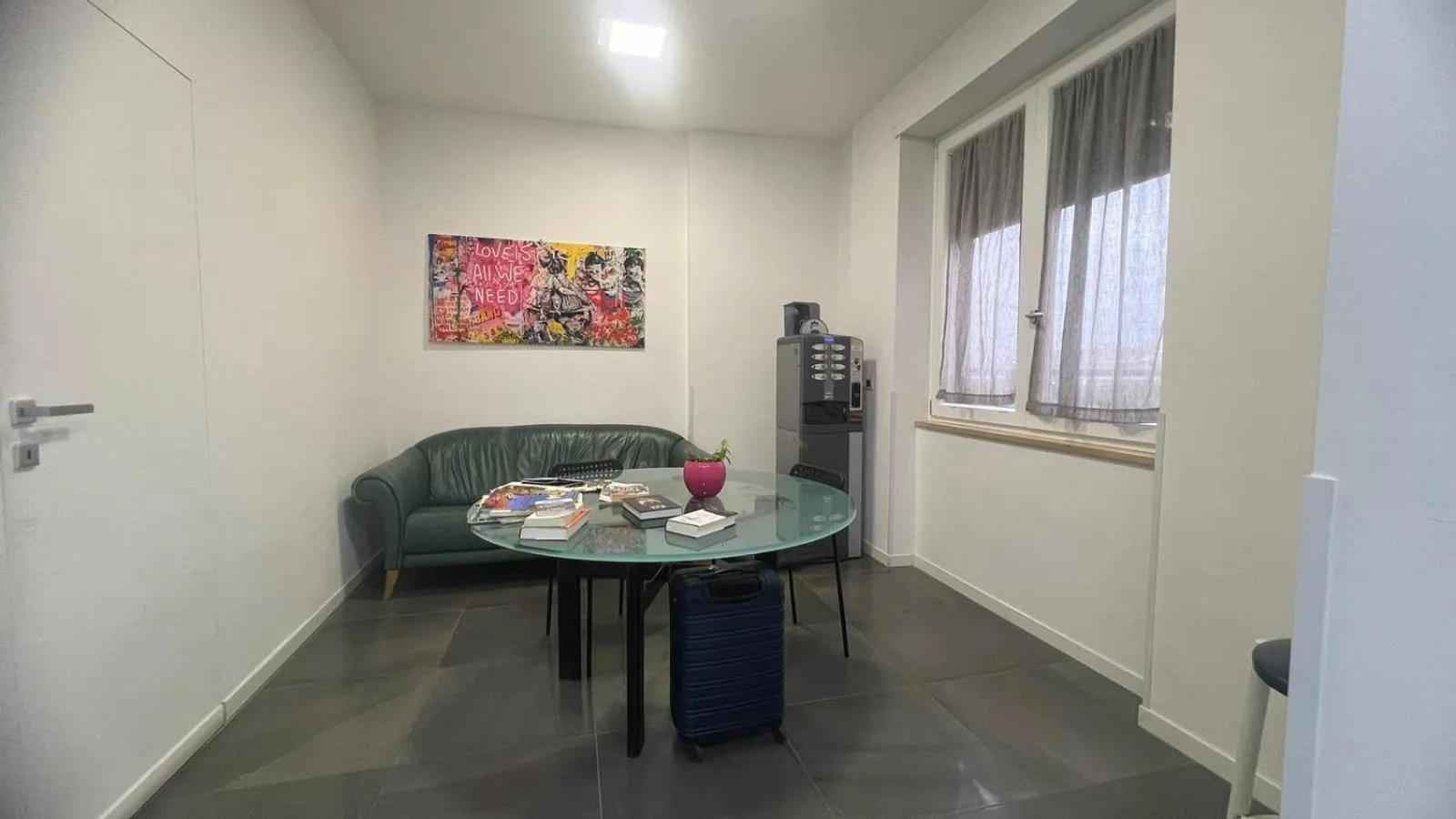 Seating area in Top Floor Rentrooms Napoli