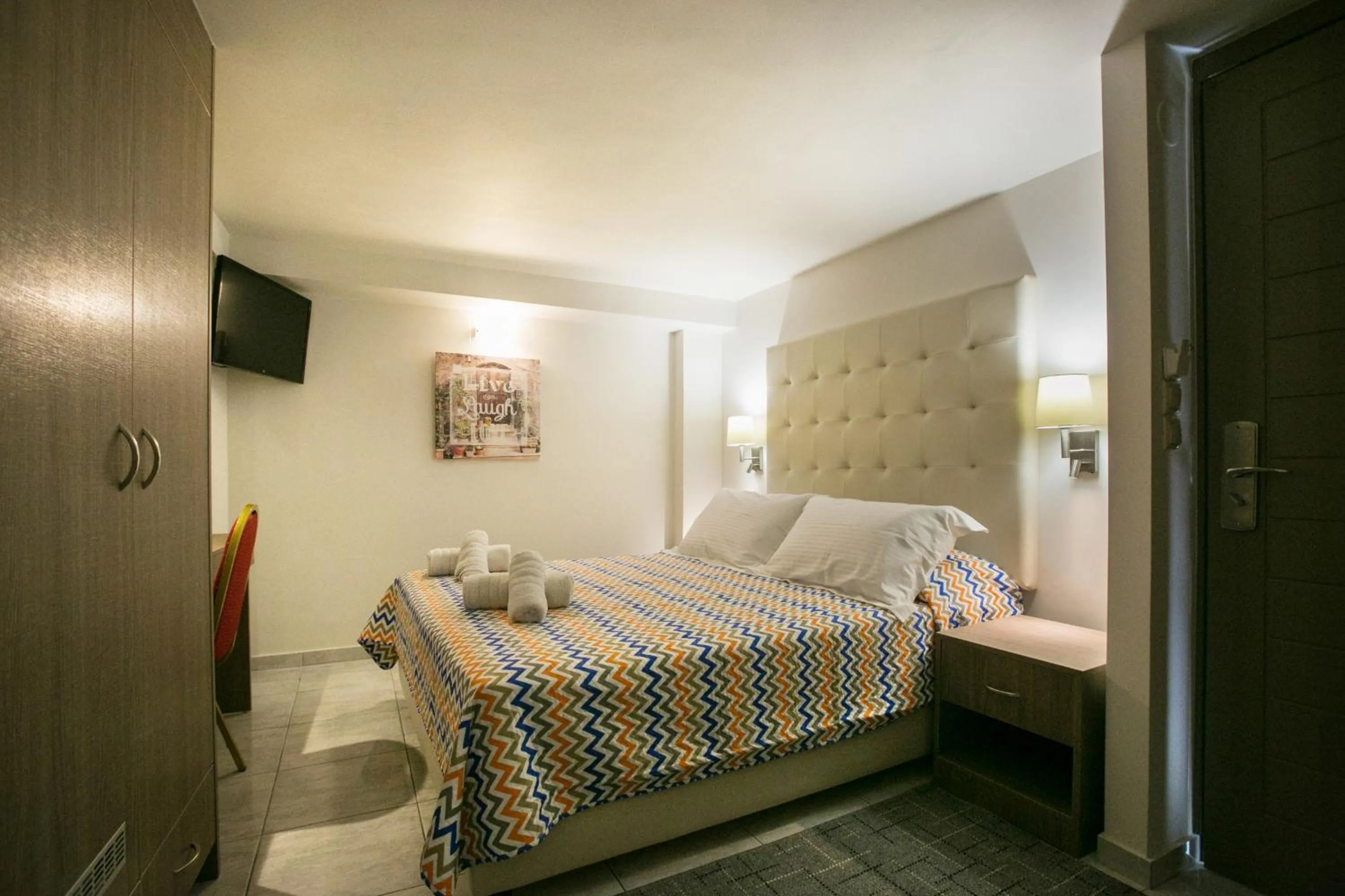 Bed in City Life Port Hotel