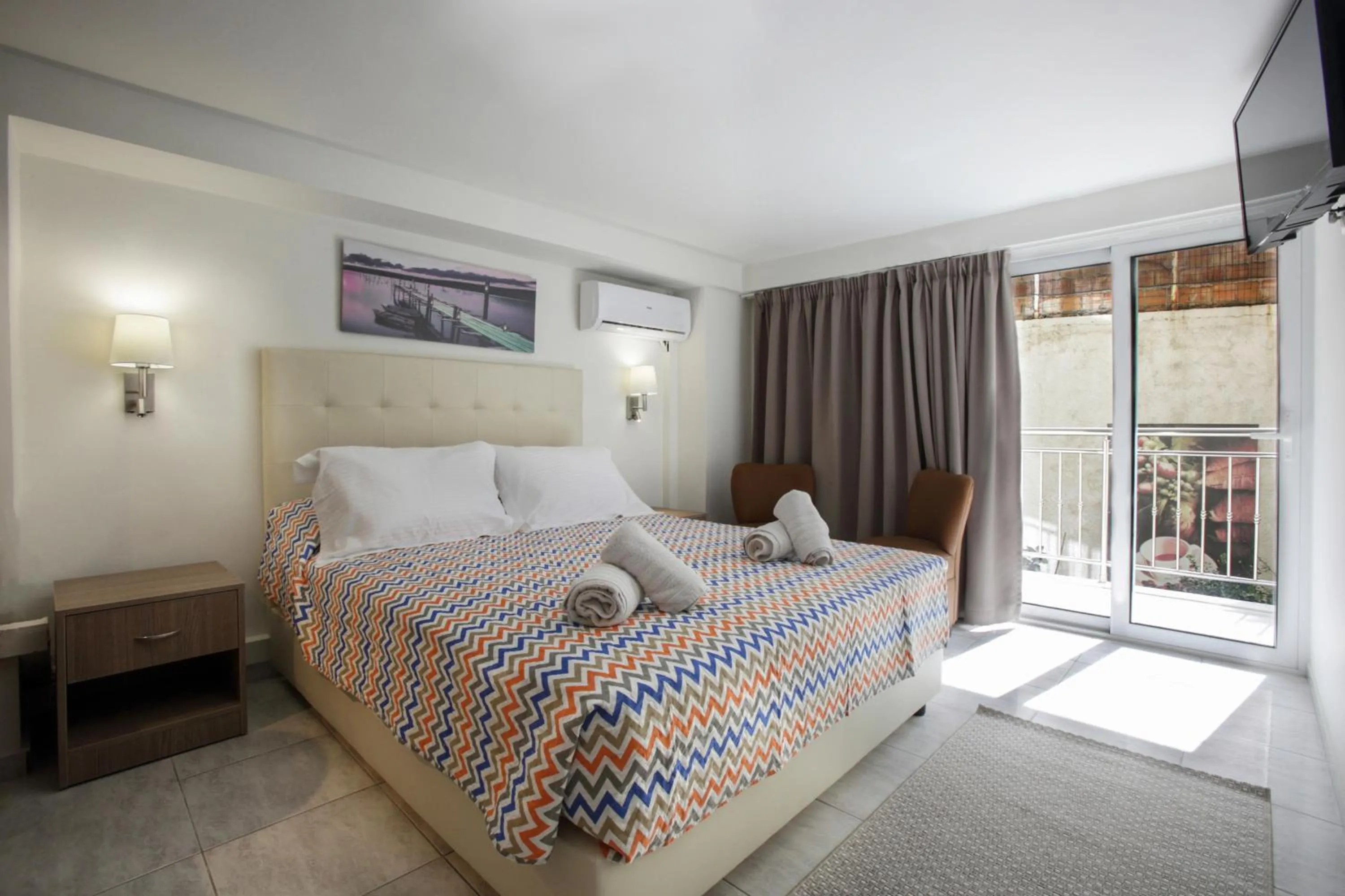 Bed in City Life Port Hotel