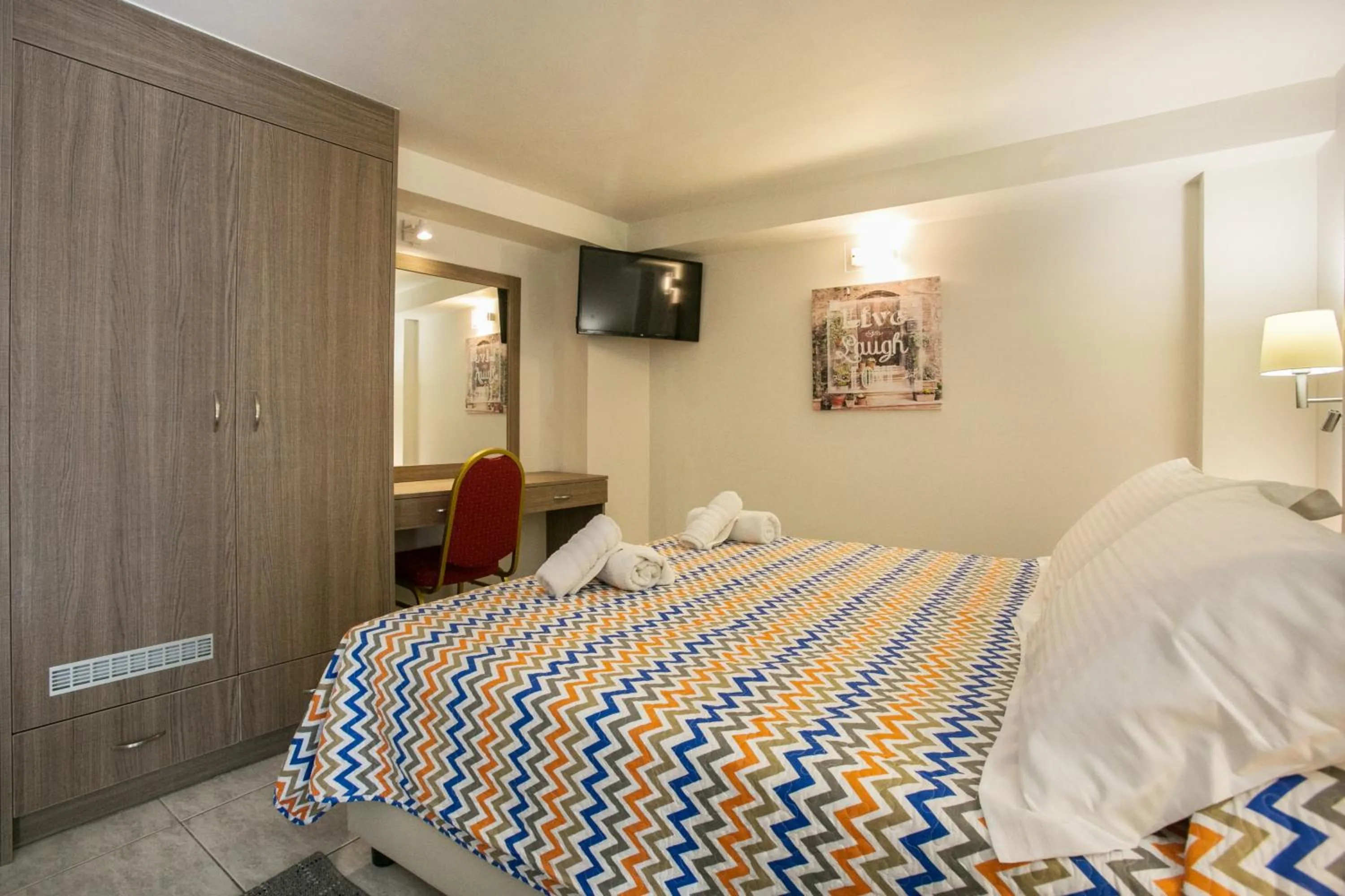 Bed in City Life Port Hotel