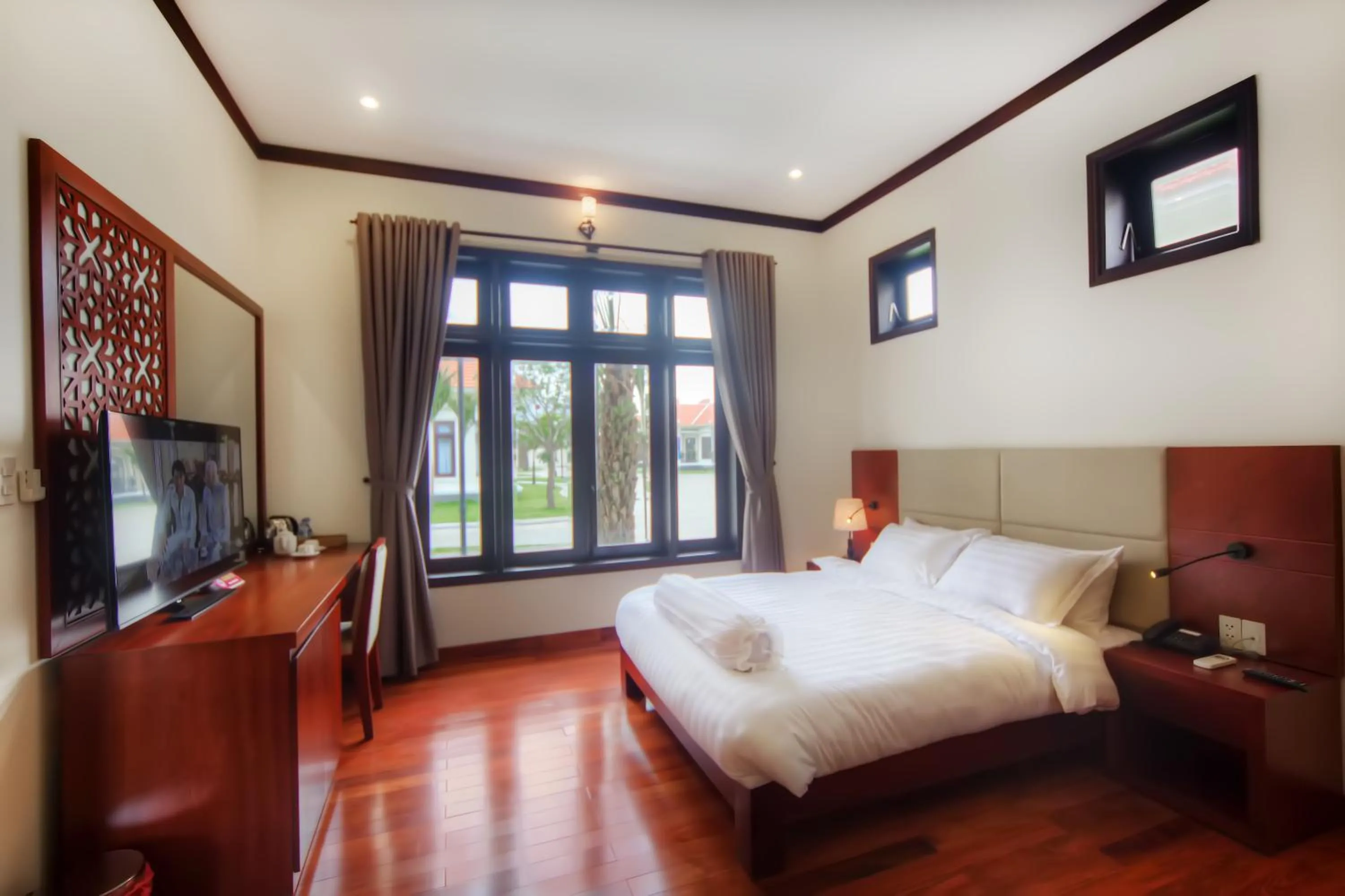 Living room, Bed in Ban Thach Riverside Hotel & Resort