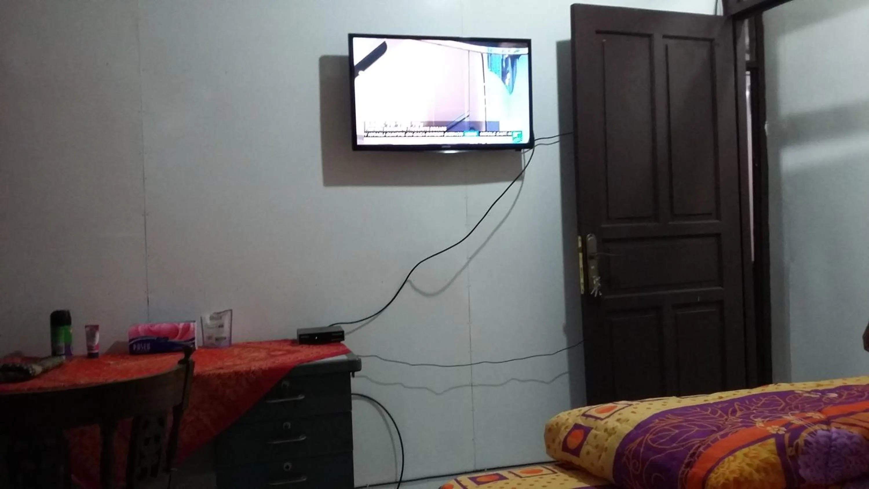 Bed in Mayestik Guest House Syariah