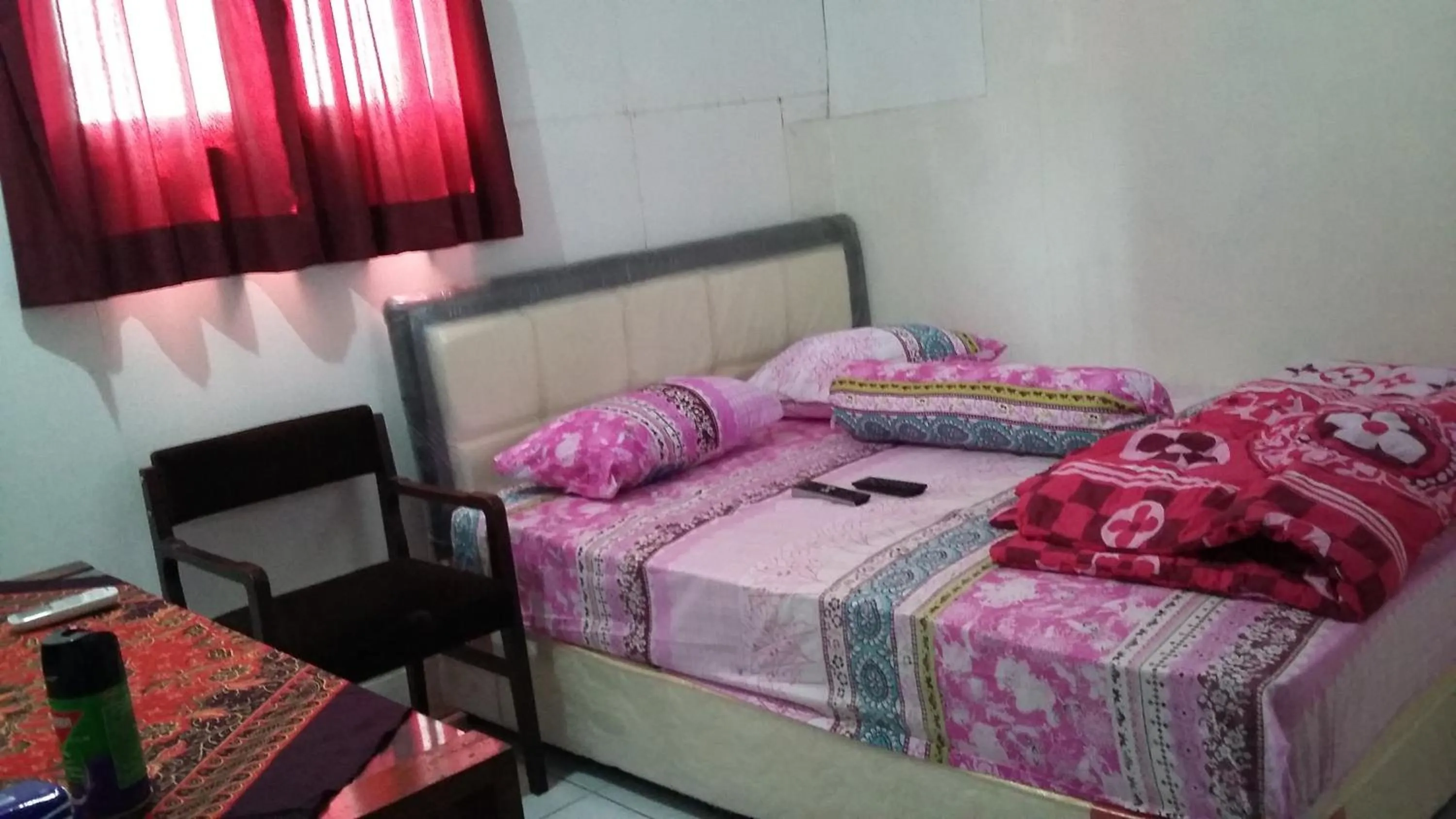 Bed in Mayestik Guest House Syariah