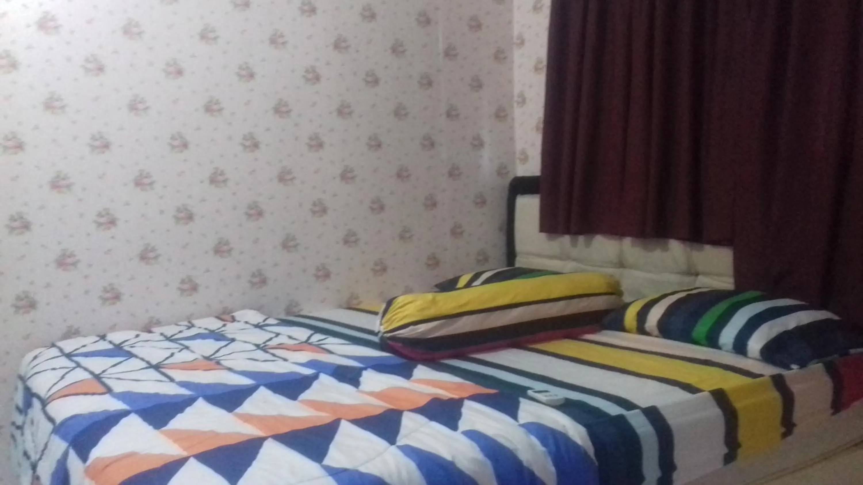 Bed in Mayestik Guest House Syariah