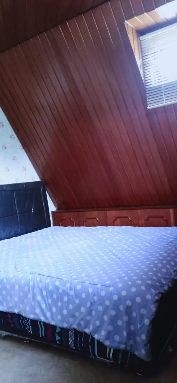 Bed in Mayestik Guest House Syariah