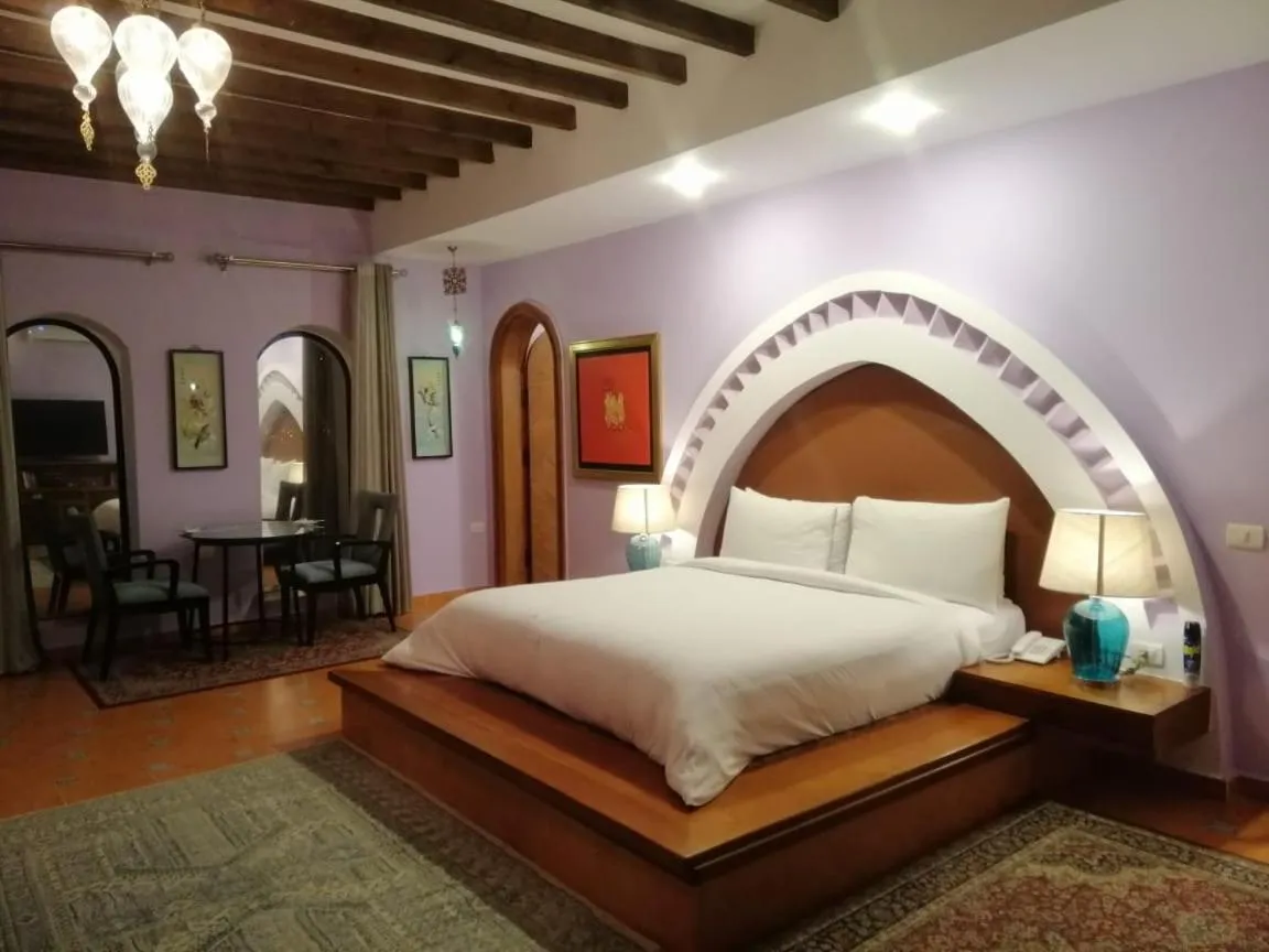 Bed in Lazib Inn Resort & Spa