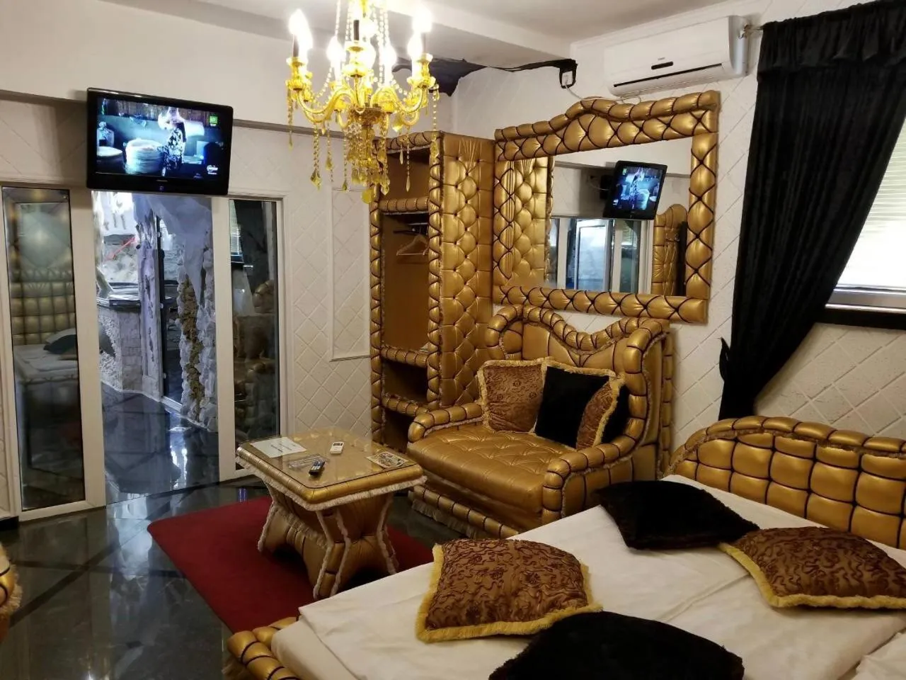 Bed in Bali Colosseum Hotel