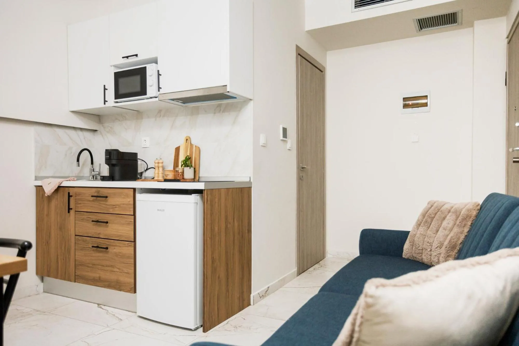 Kitchen or kitchenette in AEONS - Hotelia Hospitality Group