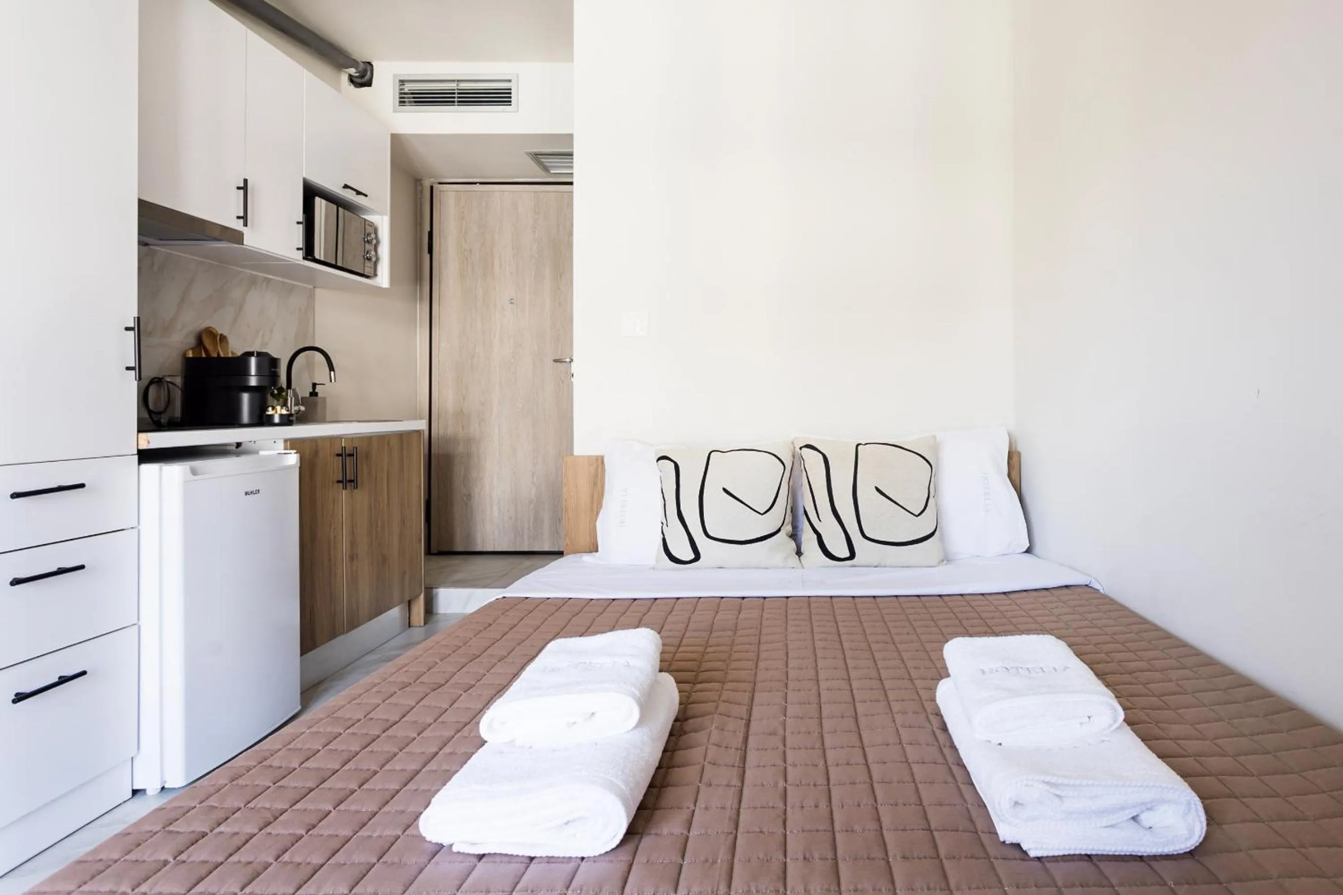 Bed in AEONS - Hotelia Hospitality Group
