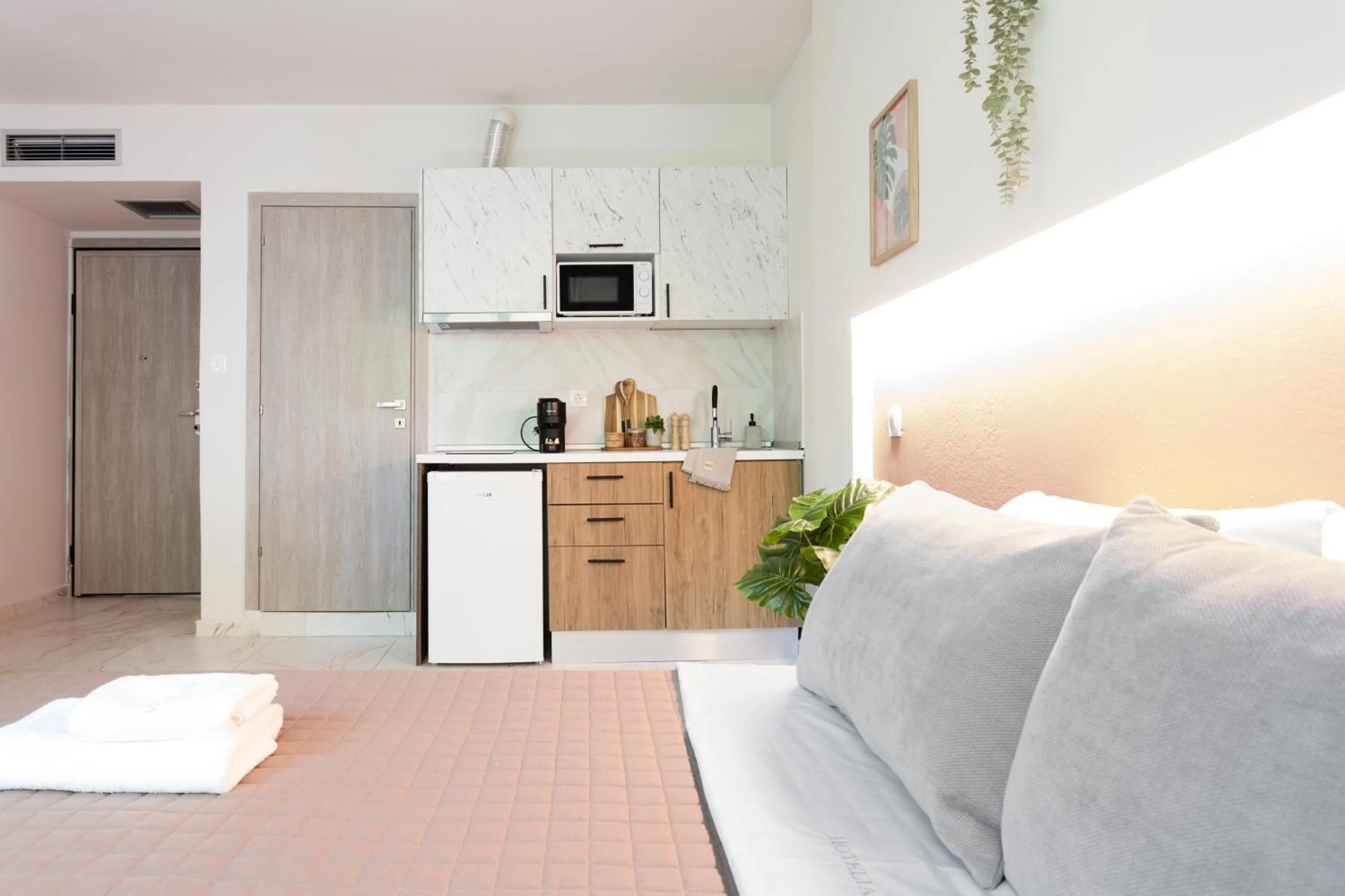 Bed in AEONS - Hotelia Hospitality Group