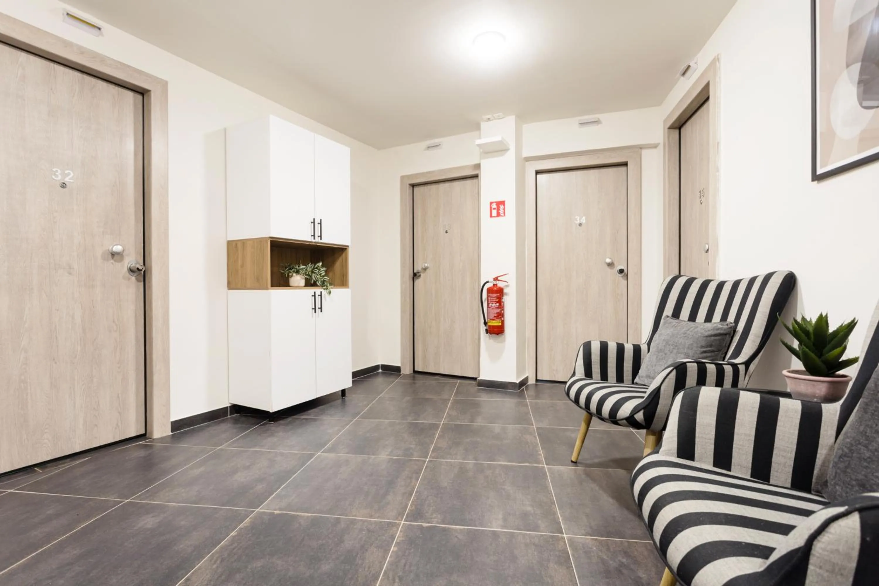 Communal lounge/ TV room in AEONS - Hotelia Hospitality Group
