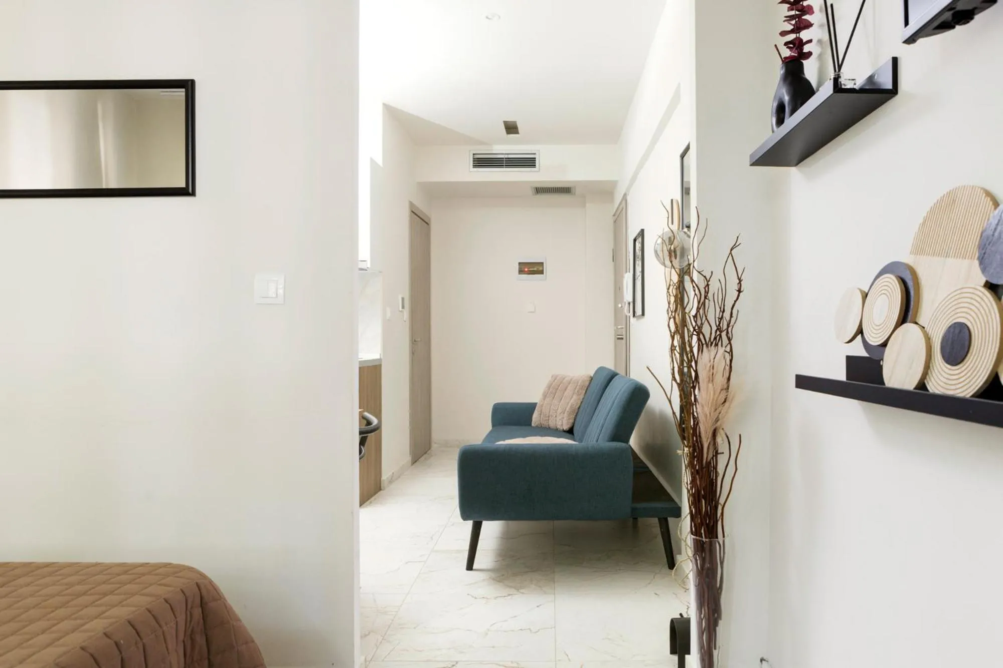 Seating area, Bed in AEONS - Hotelia Hospitality Group