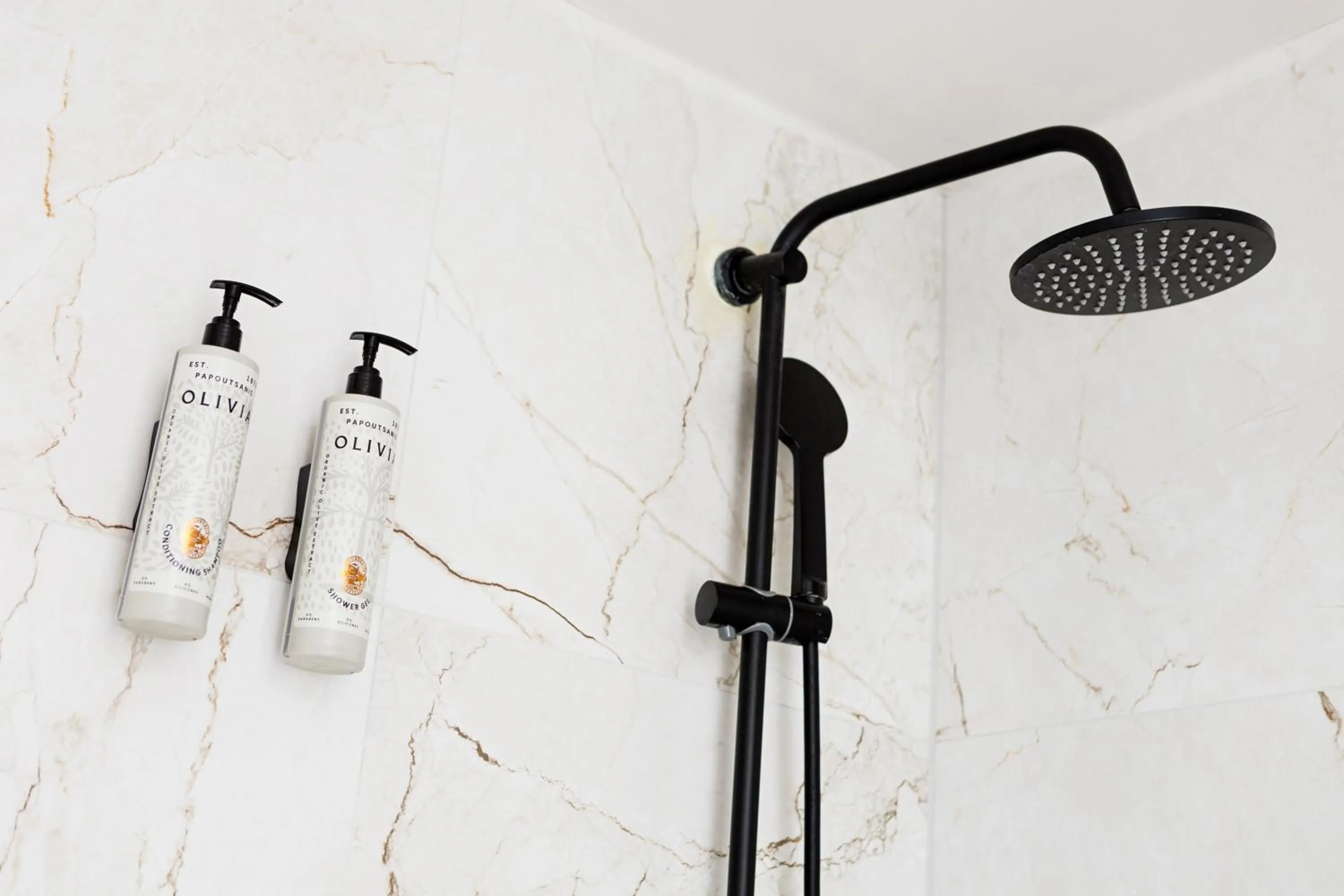 Shower in AEONS - Hotelia Hospitality Group