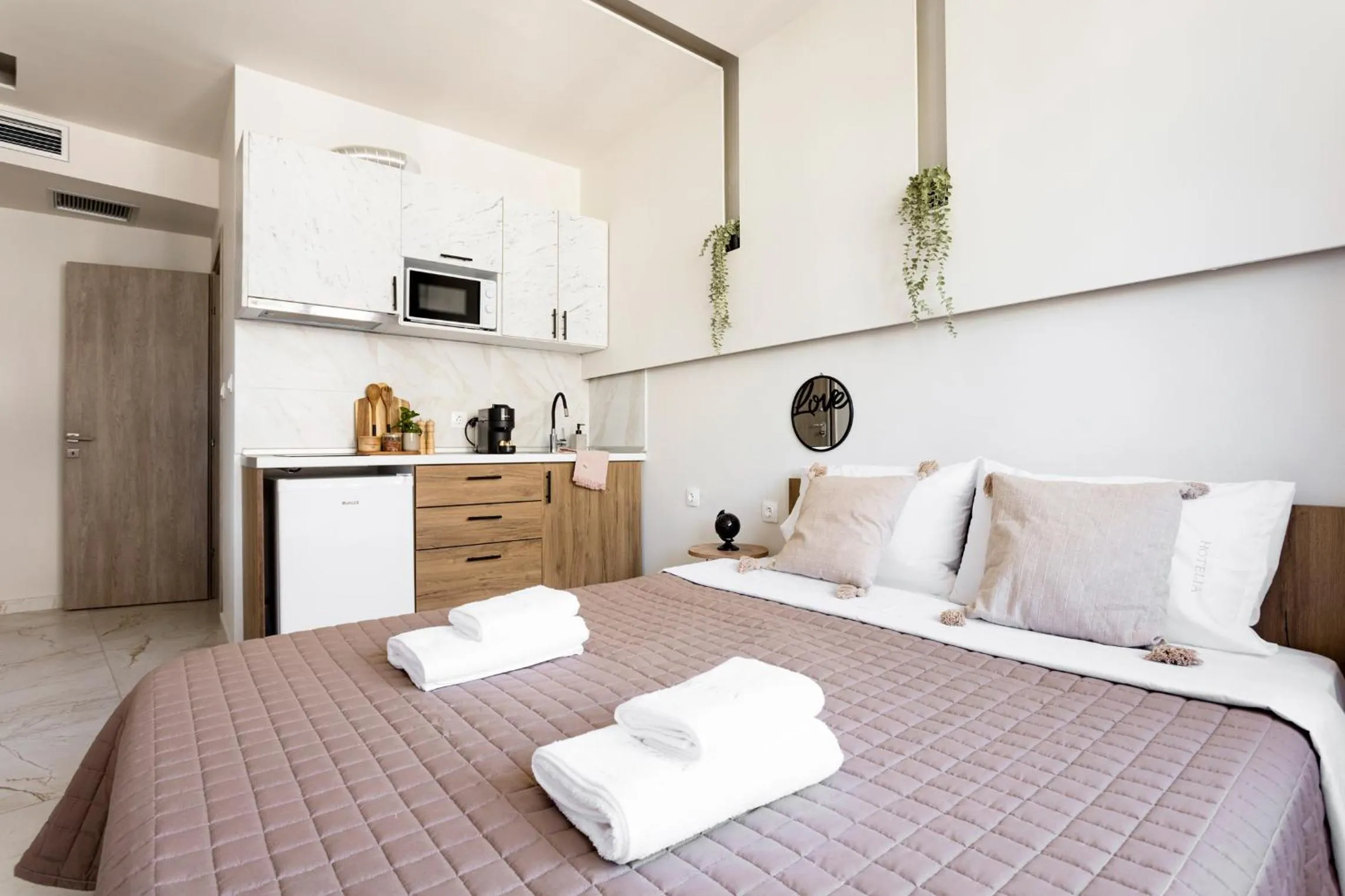 Bed in AEONS - Hotelia Hospitality Group