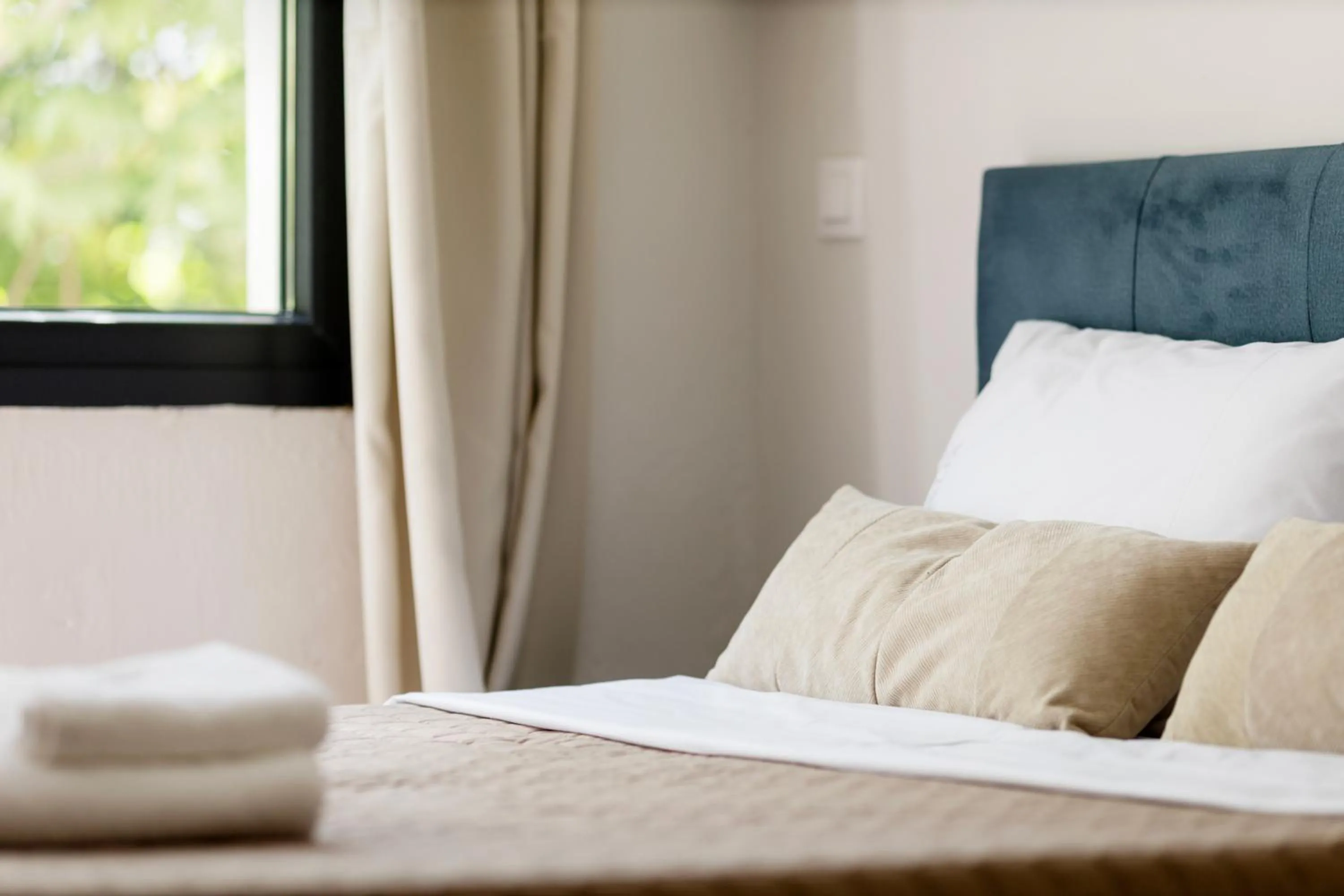 Bed in AEONS - Hotelia Hospitality Group