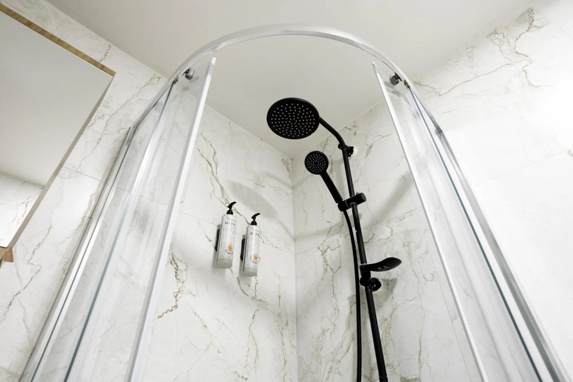 Shower in AEONS - Hotelia Hospitality Group