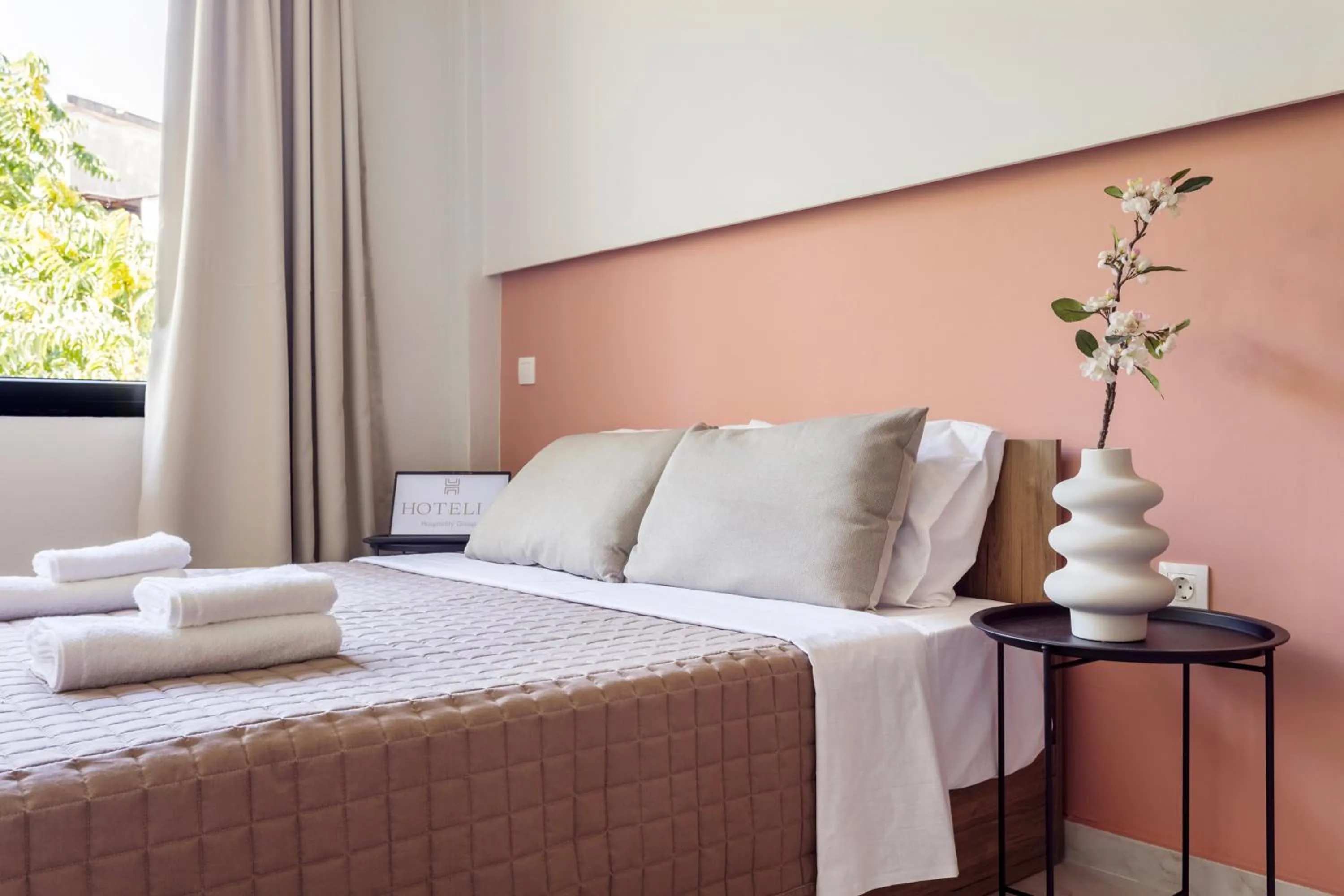 Bed in AEONS - Hotelia Hospitality Group