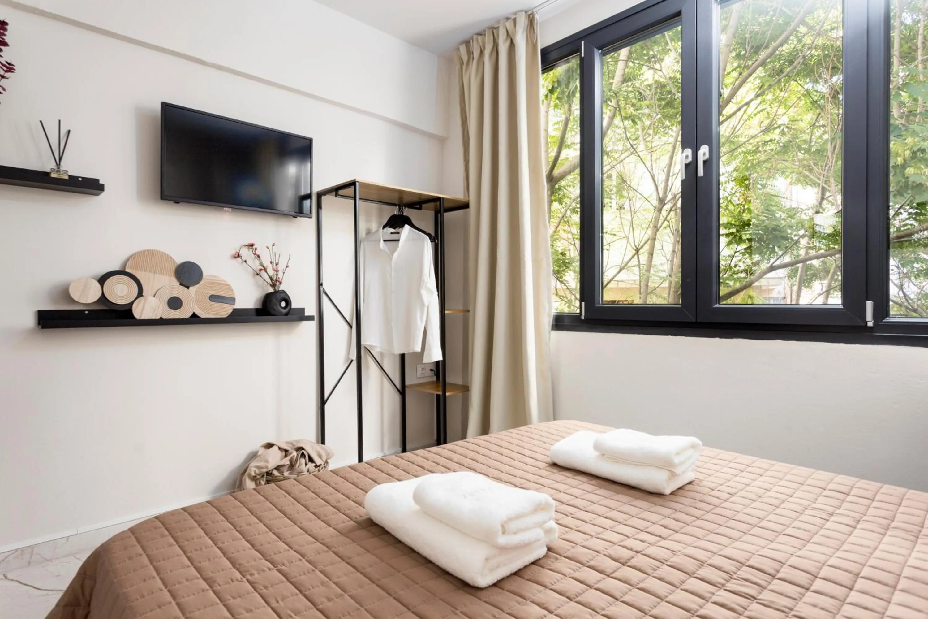 TV and multimedia, Bed in AEONS - Hotelia Hospitality Group