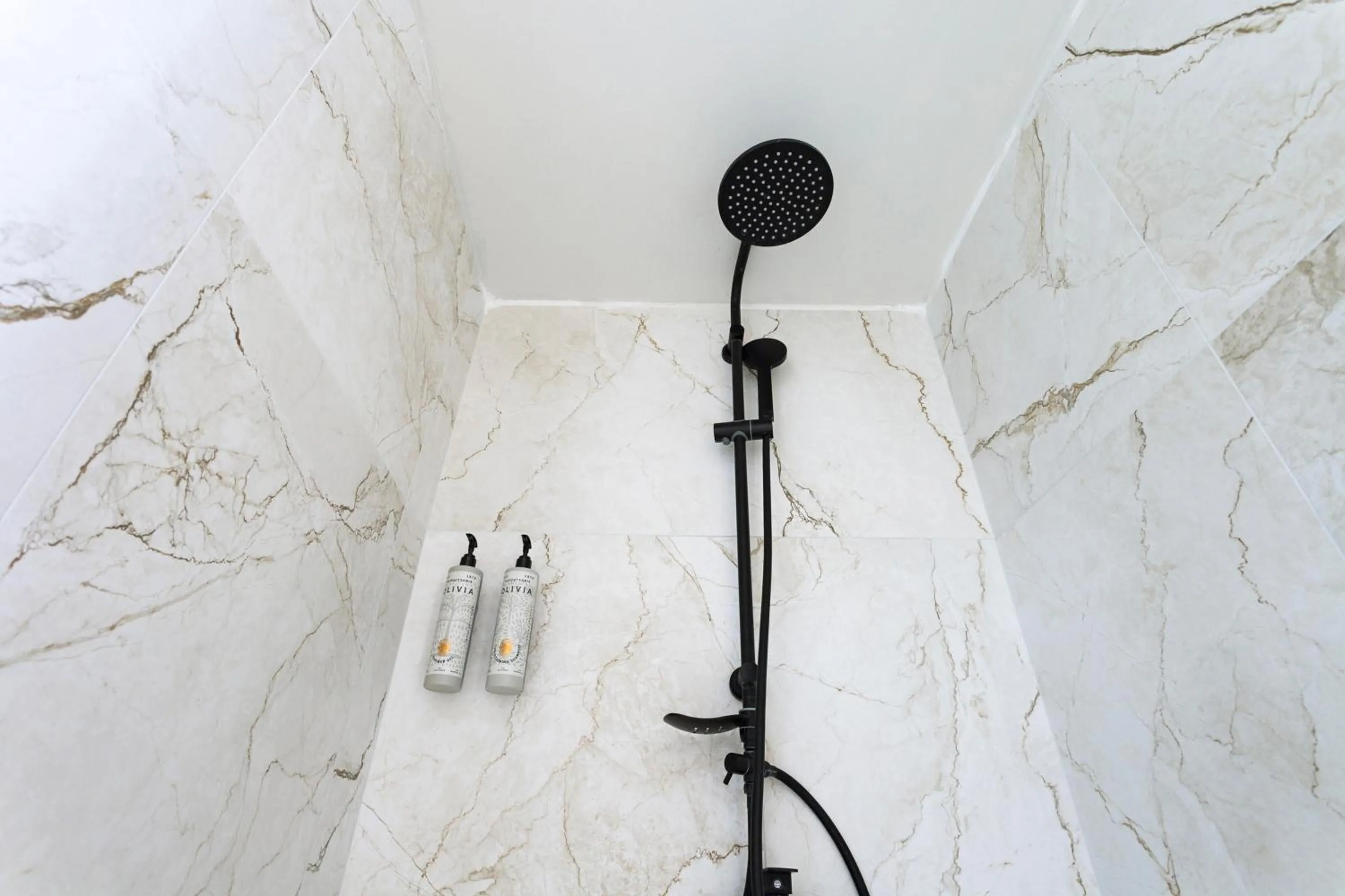 Shower in AEONS - Hotelia Hospitality Group