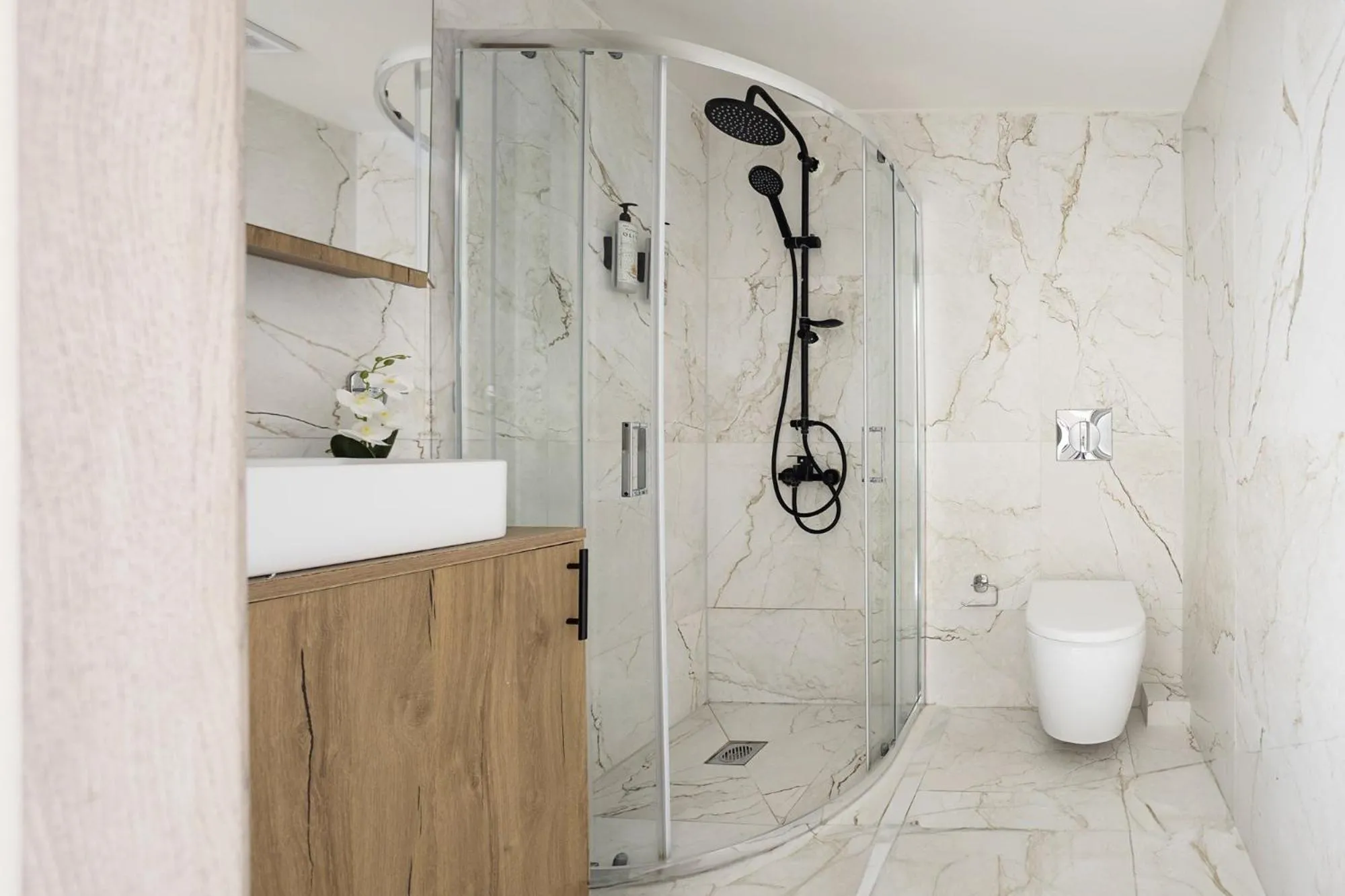 Shower in AEONS - Hotelia Hospitality Group