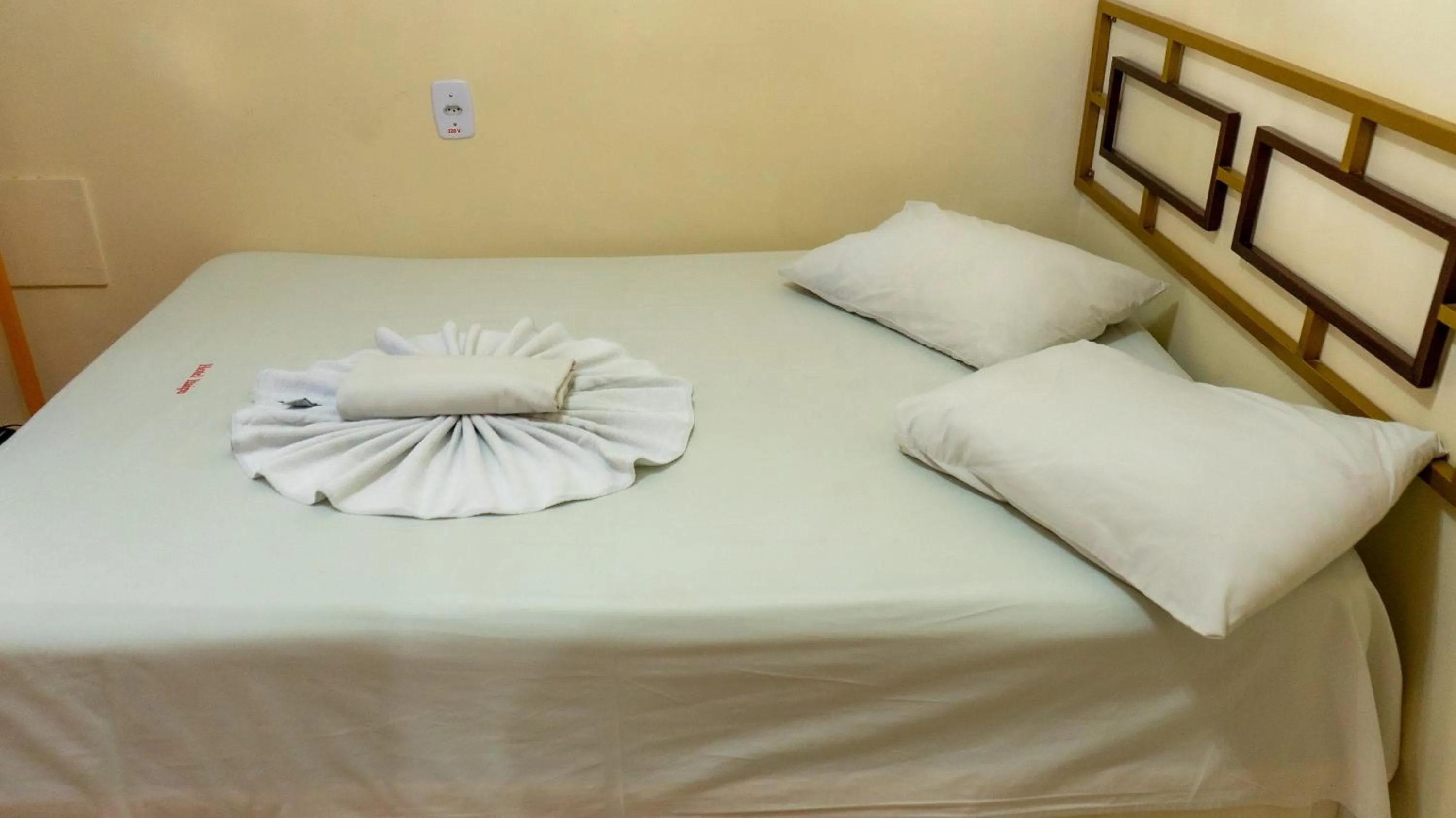 Bed in Hotel Itaipu