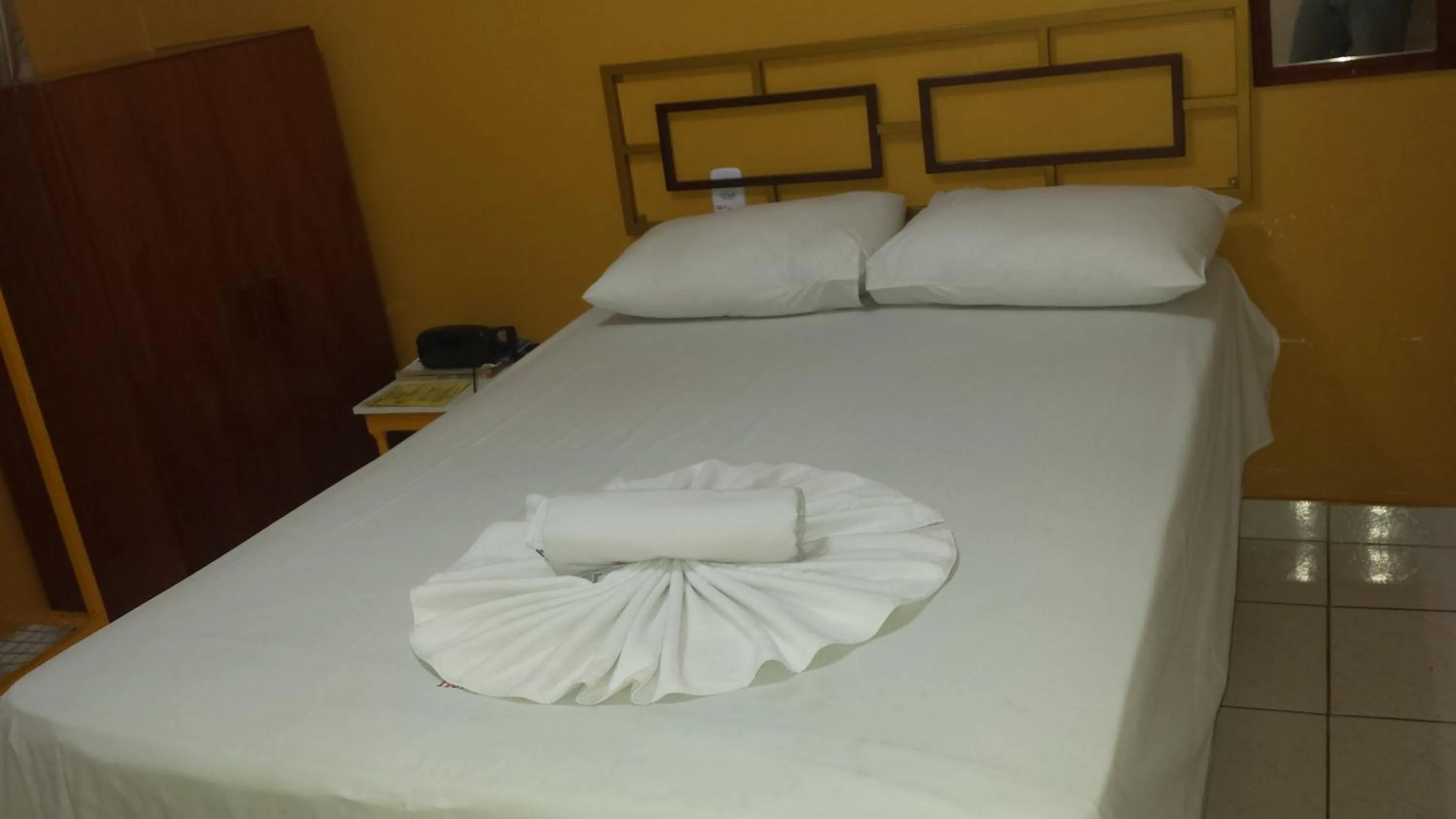 Bed in Hotel Itaipu