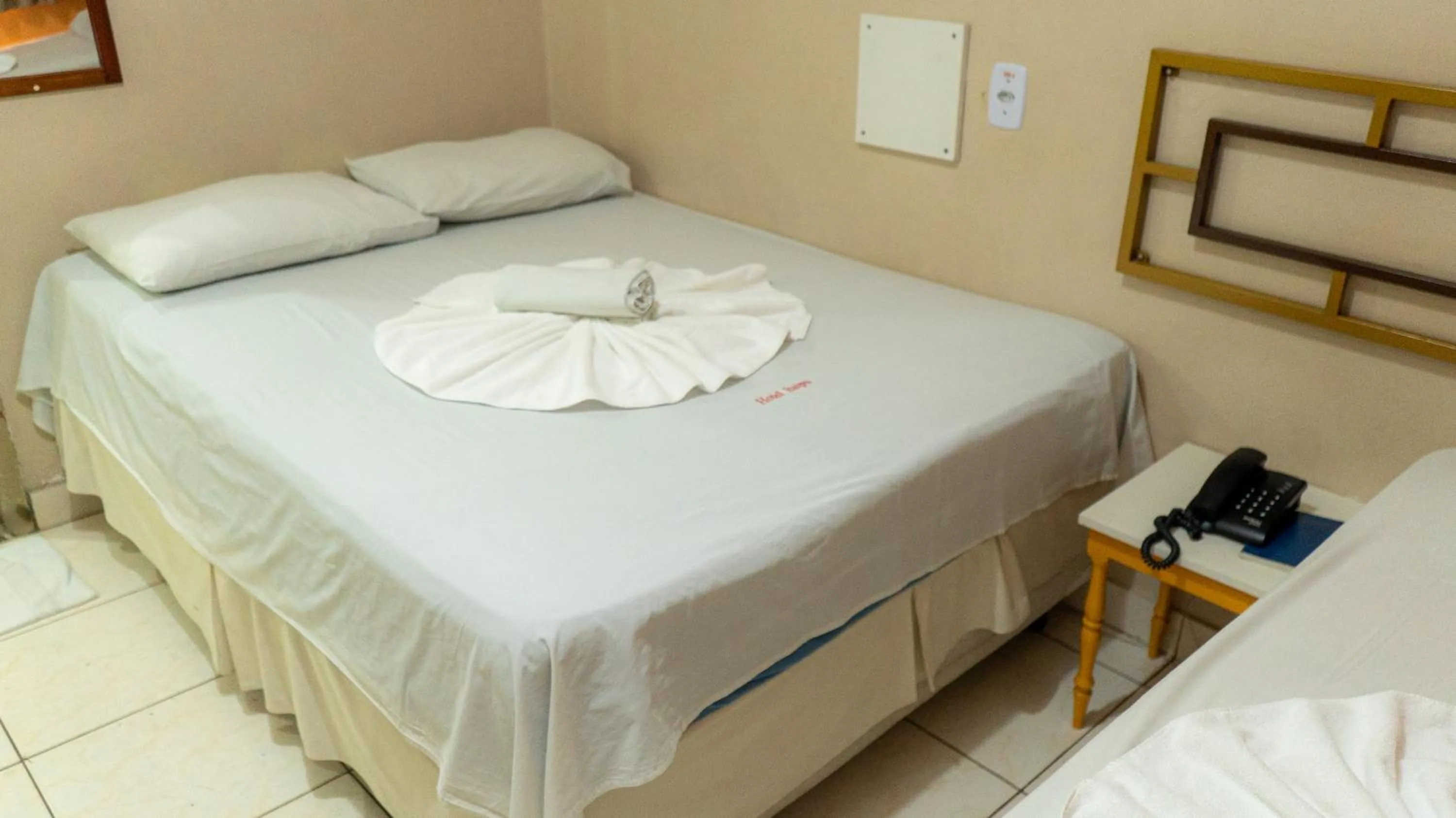 Bed in Hotel Itaipu