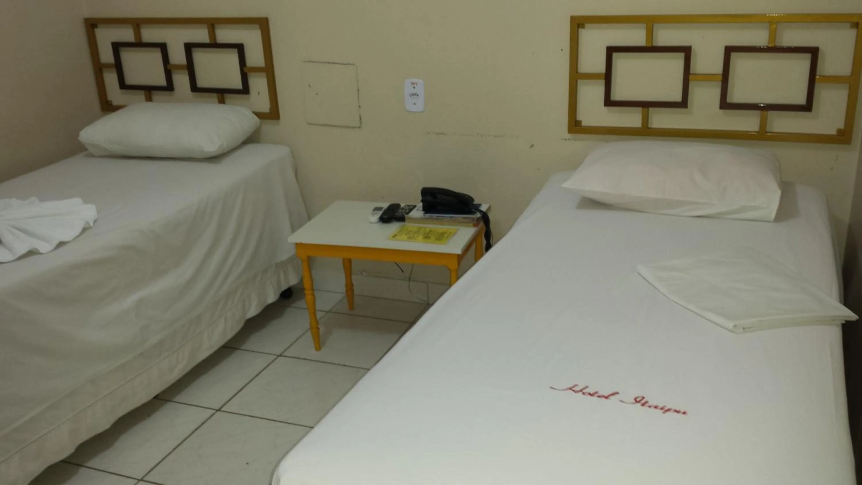 Bed in Hotel Itaipu
