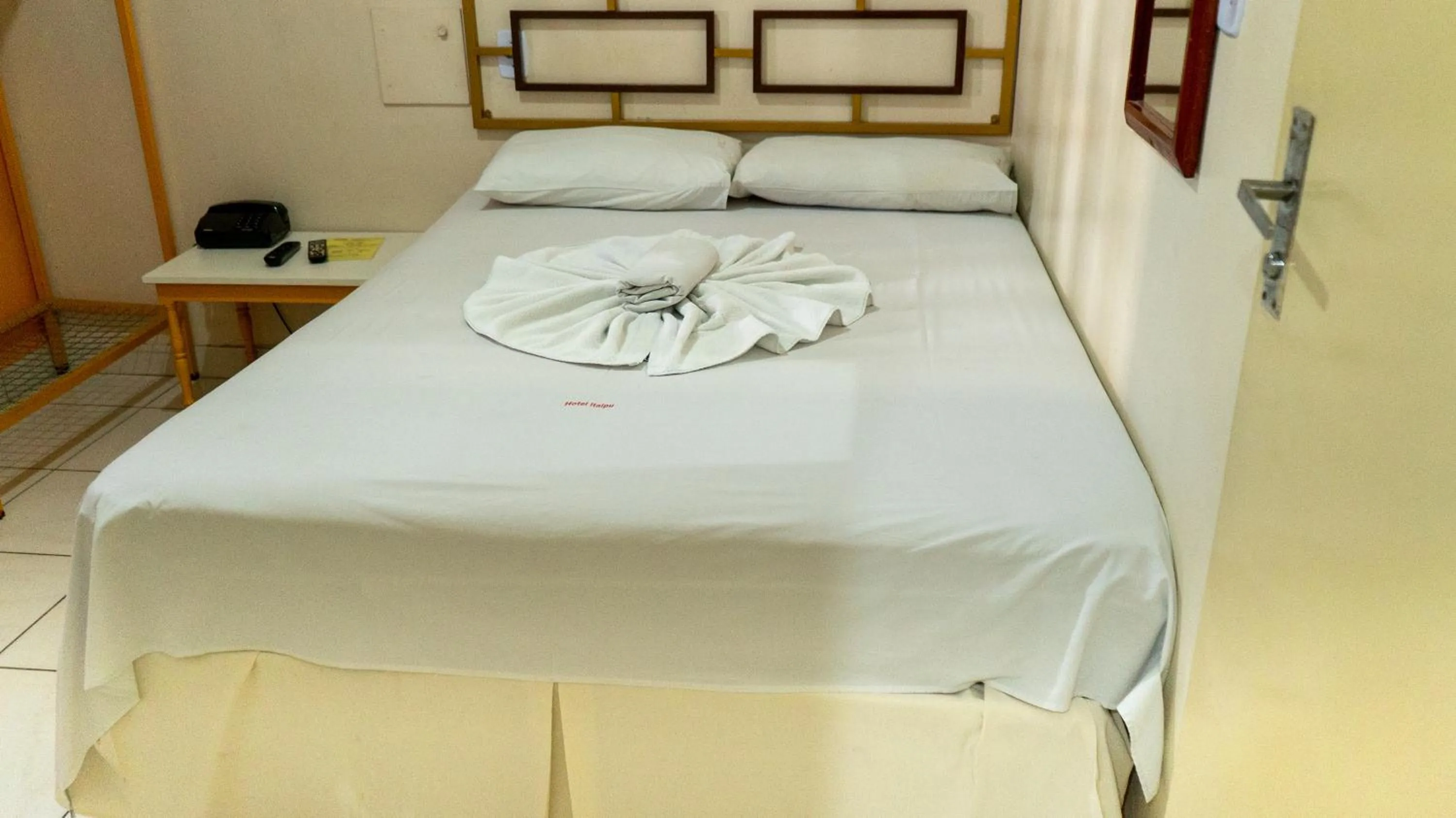 Bed in Hotel Itaipu