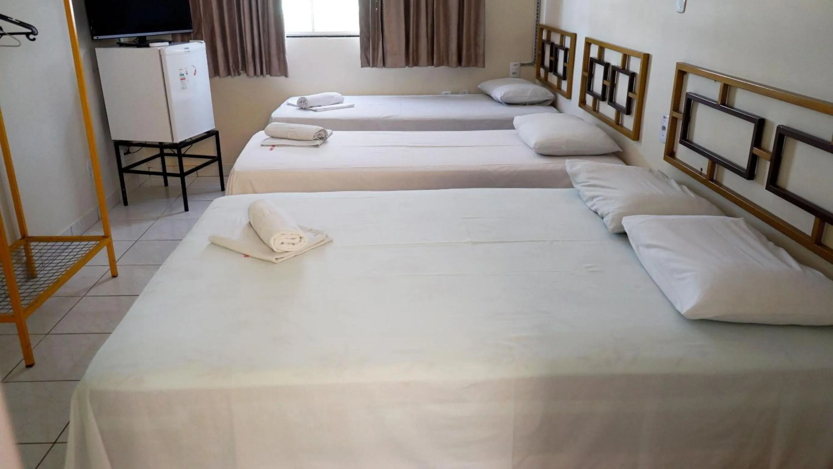 Bed in Hotel Itaipu