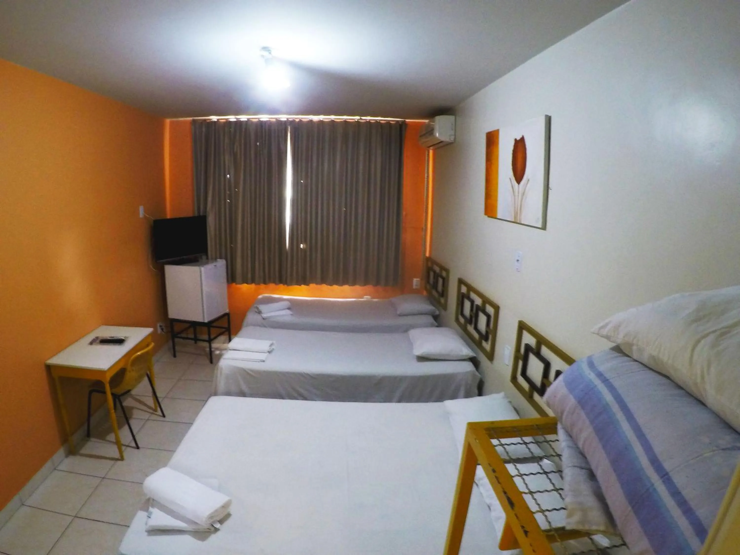 Bed in Hotel Itaipu