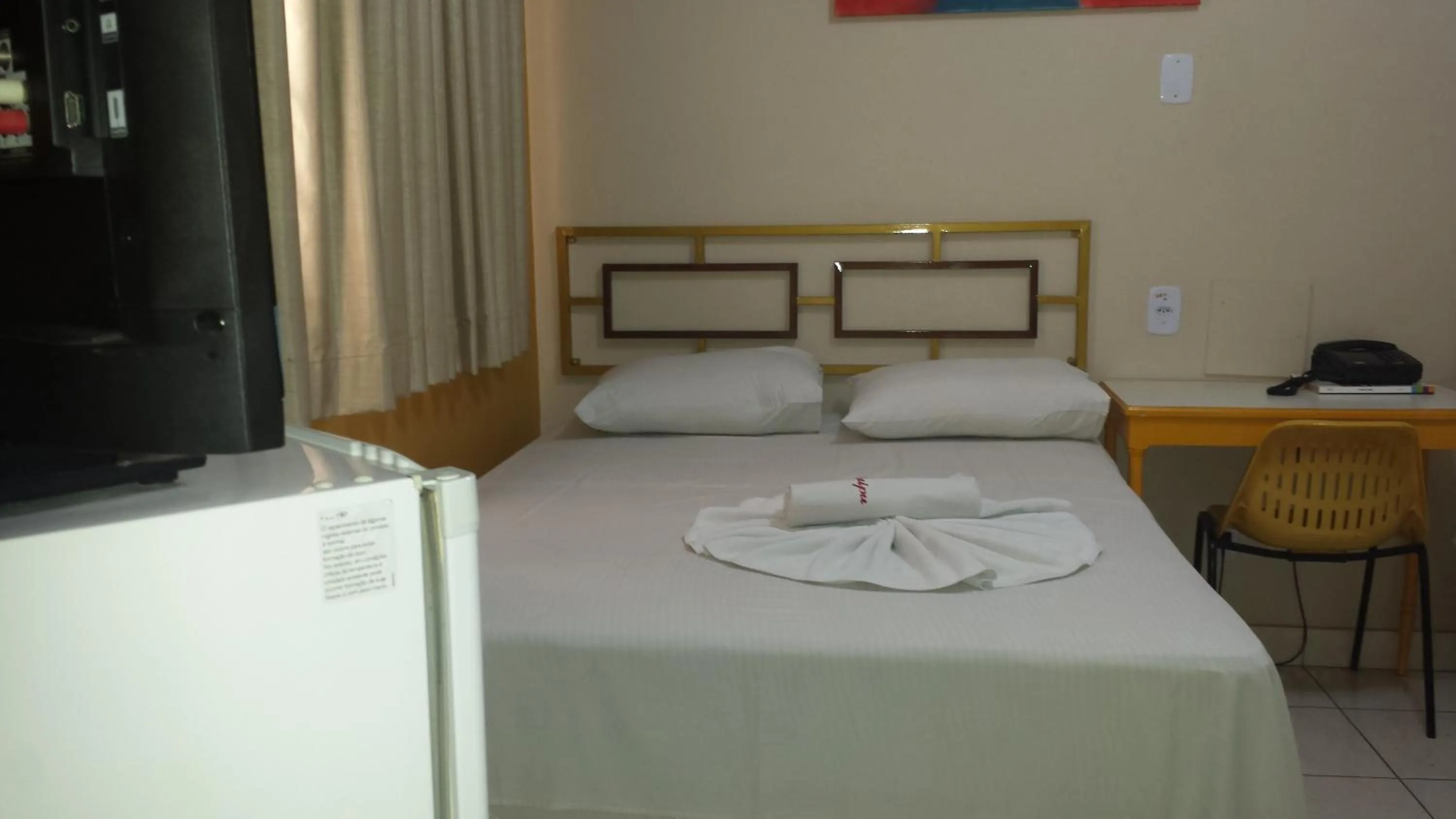 Bed in Hotel Itaipu