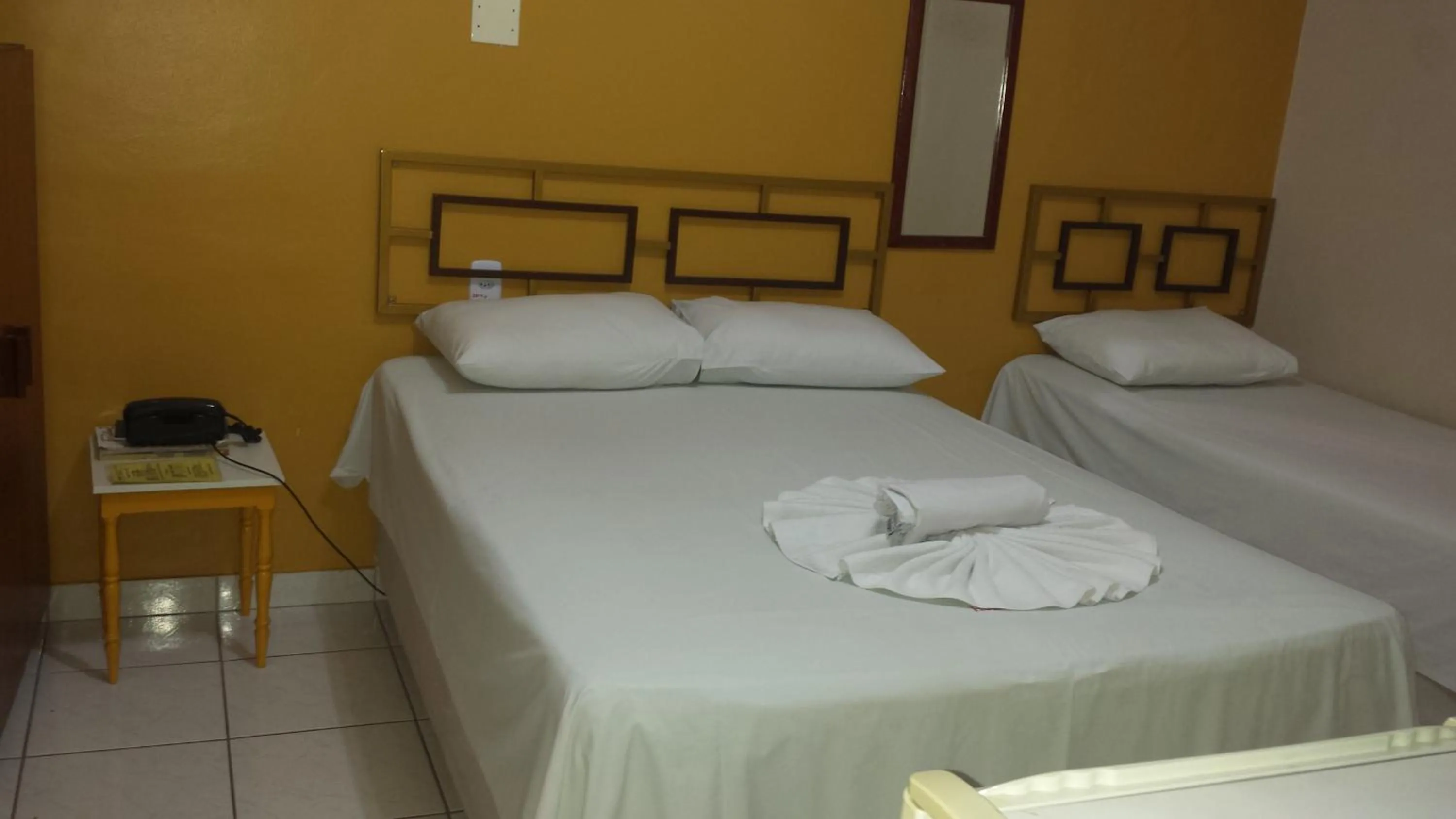 Bed in Hotel Itaipu