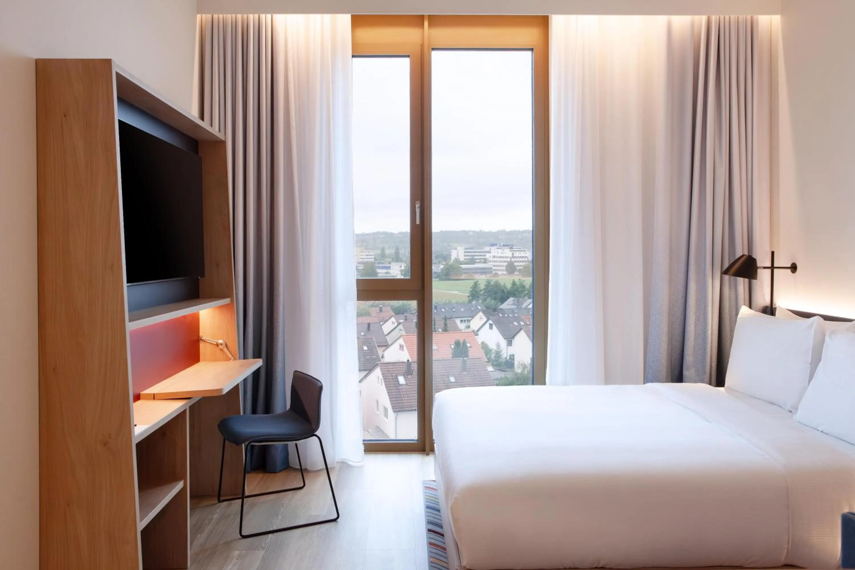 Bedroom, Bed in Hampton By Hilton Stuttgart Airport