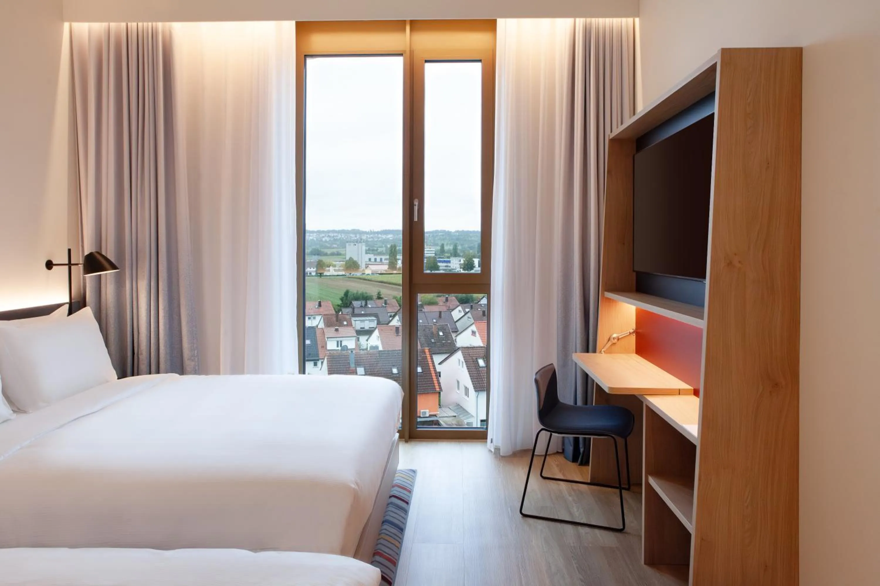 Bedroom, Bed in Hampton By Hilton Stuttgart Airport