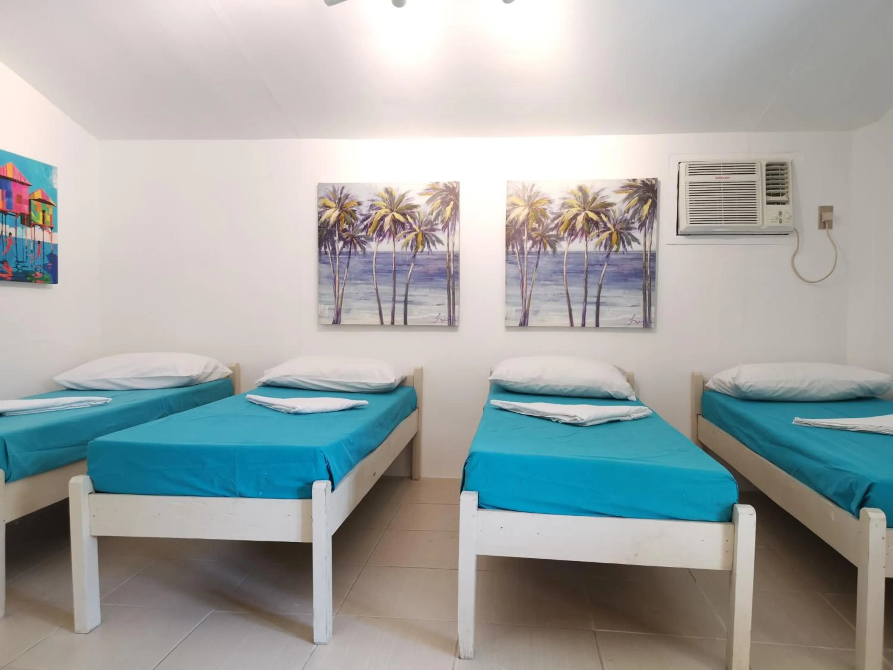 Superior Quadruple Room in La Vida Hostel Samal Island