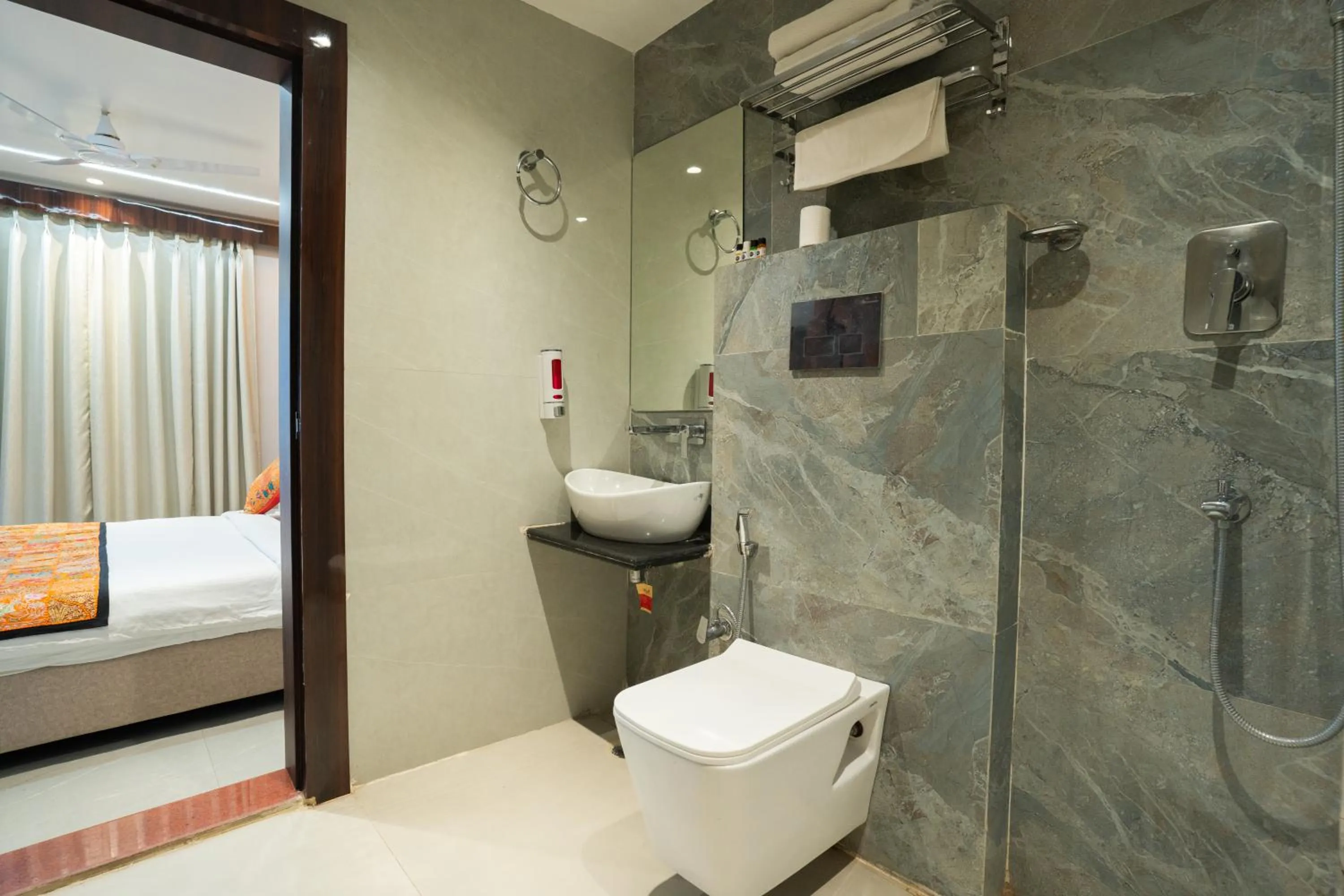 Bathroom in Tripli Hotels Evara Inn