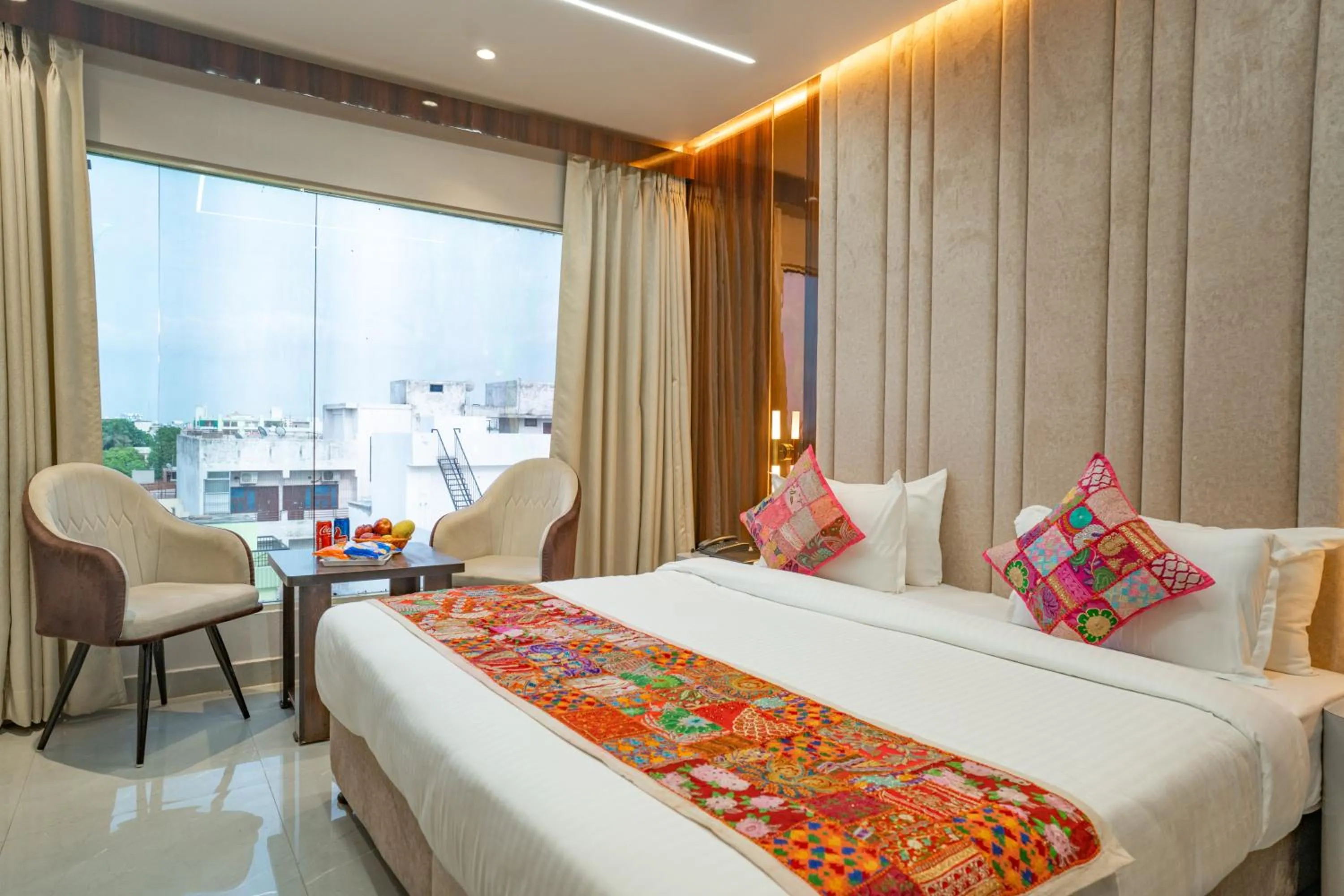 Photo of the whole room, Bed in Tripli Hotels Evara Inn