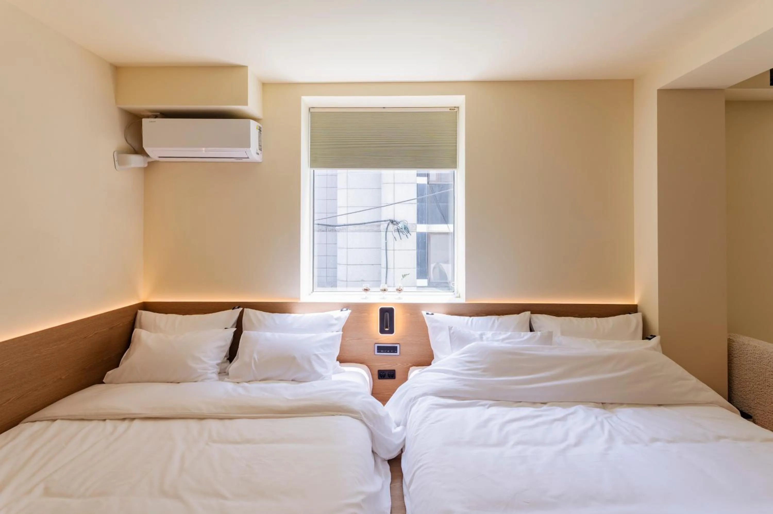 Bed in Yeobaek Hotel