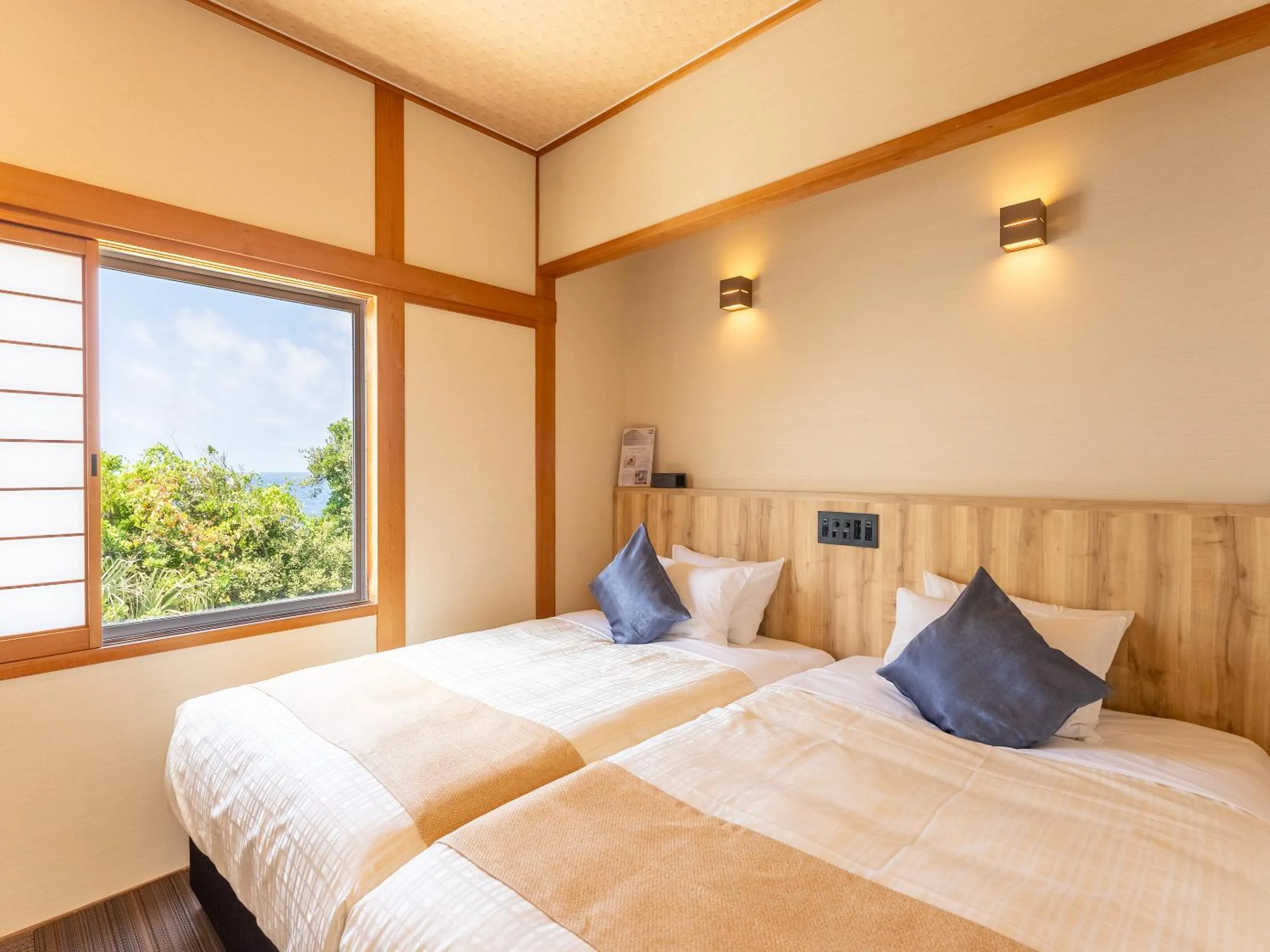 Bed in Livemax Resort Inami Seafront