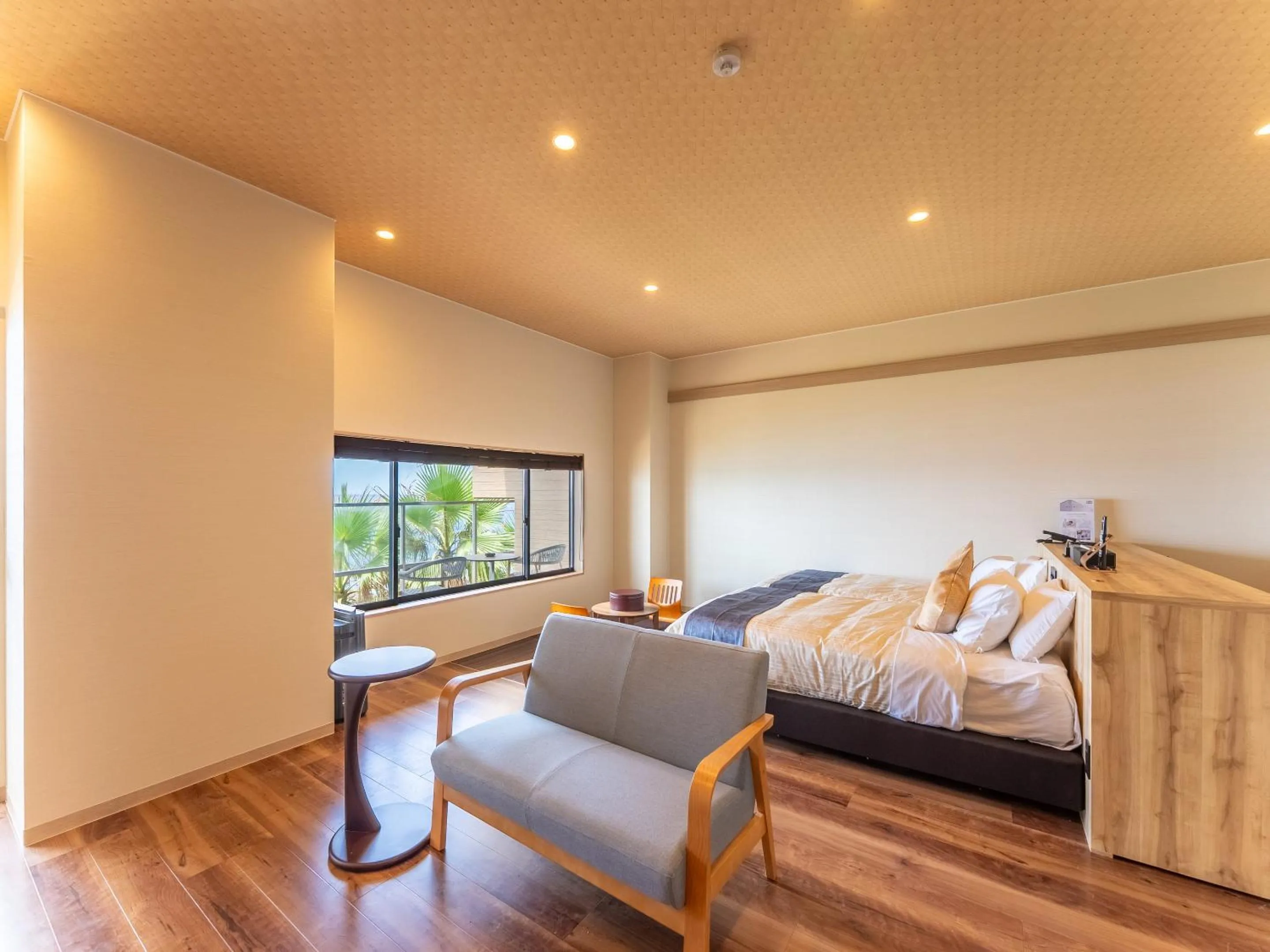 Bed in Livemax Resort Inami Seafront