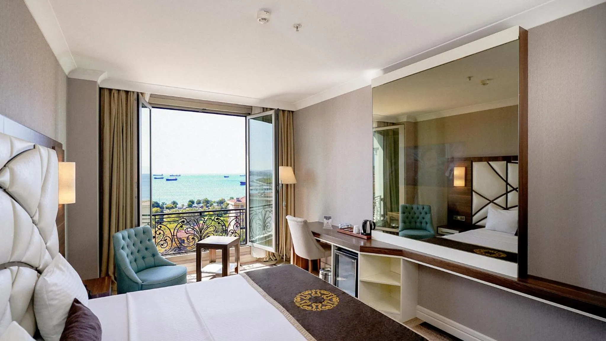 Bed in The Grand Mira Business Hotel